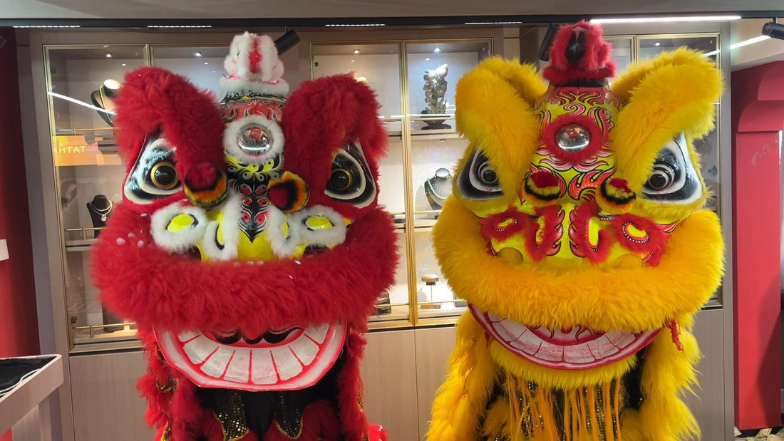 The traditional red and gold lion dance ceremony marking the auspicious opening of TATHATĀ's Global Jewelry Supply Chain headquarters, honoring 30 years of jadeite heritage.