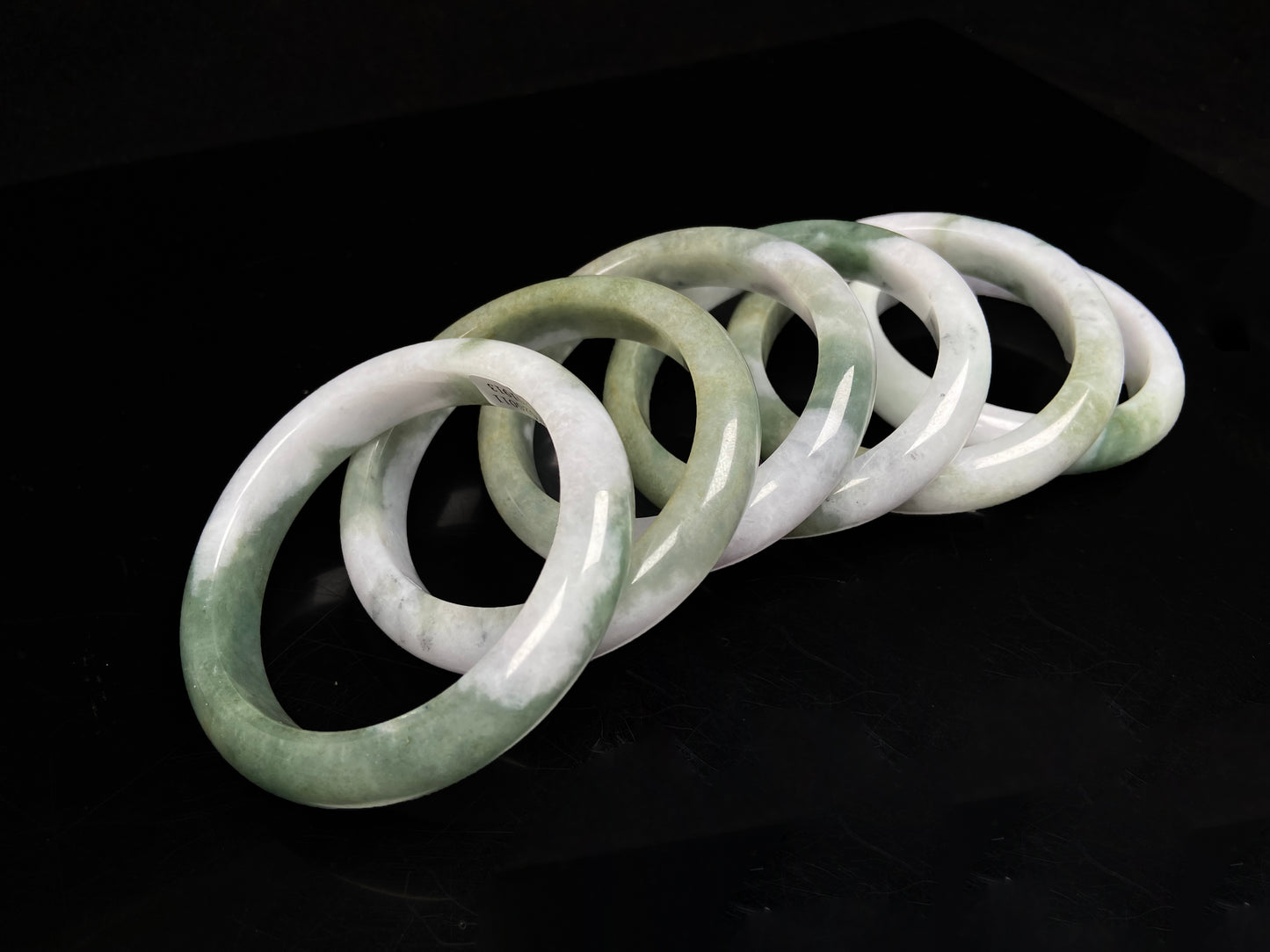 Snowy bamboo streaming lightly  jadeite bangles.