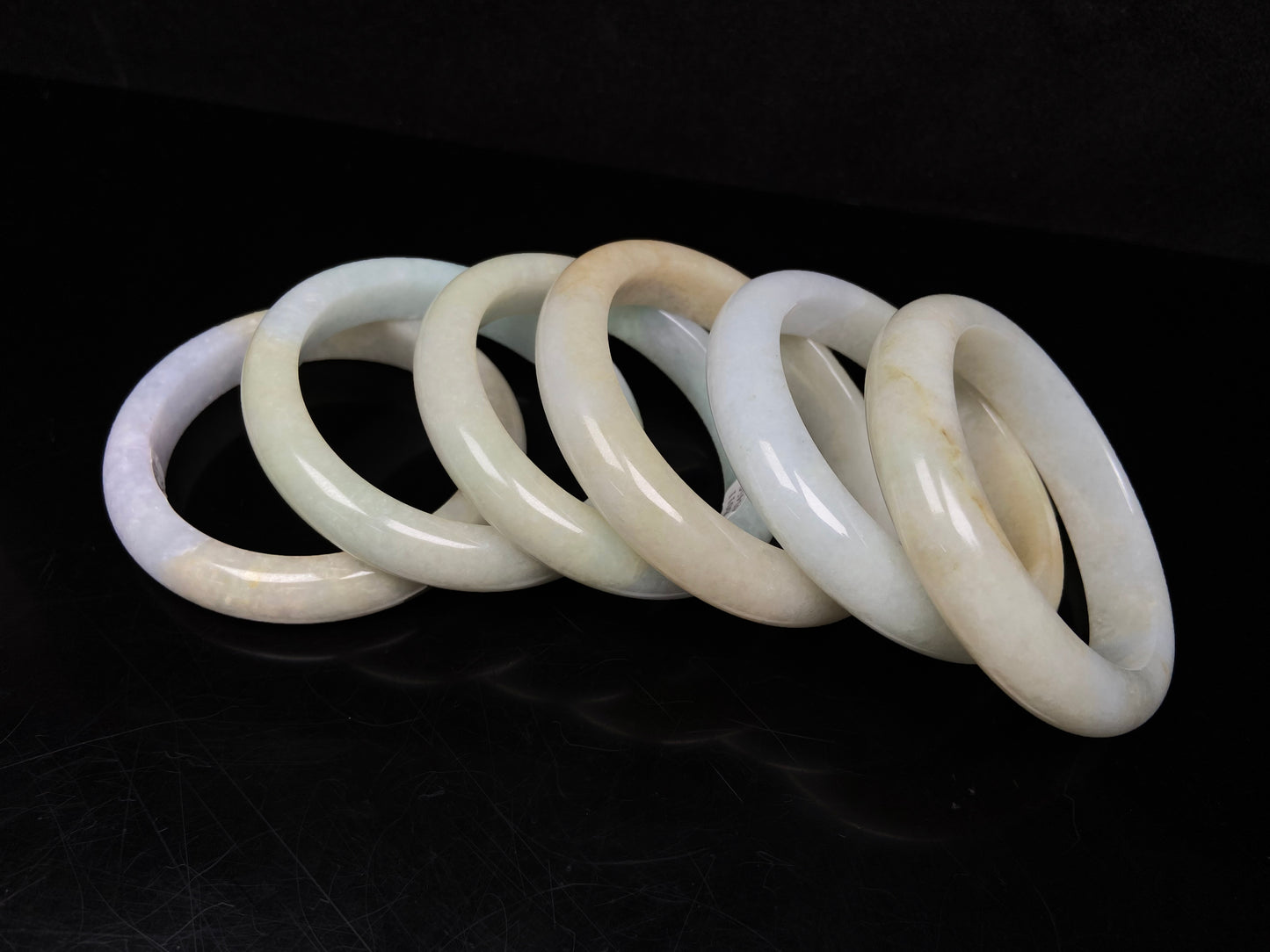 Golden shimmers sprinkling lightly jadeite bangle.