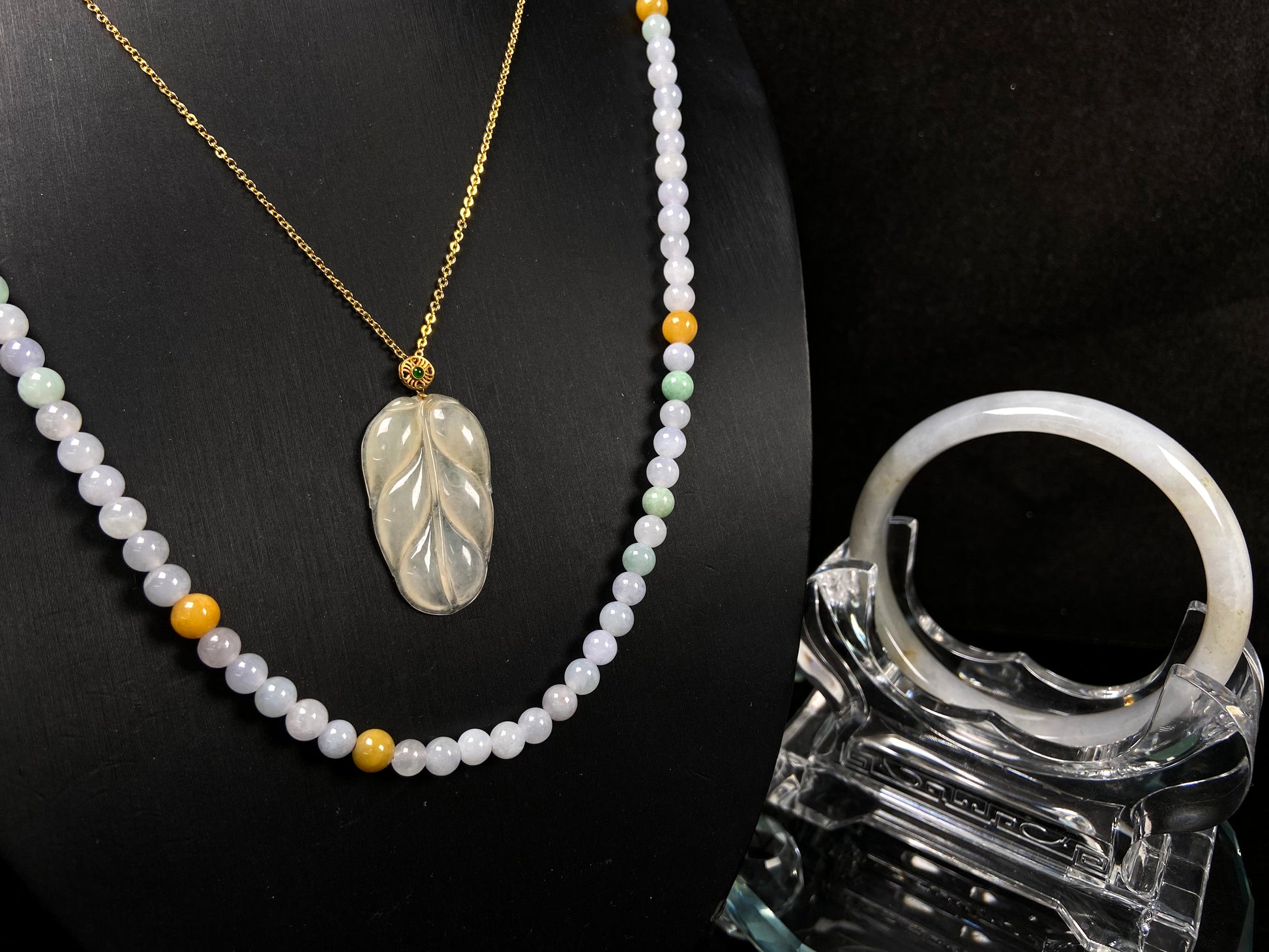 A three-tone milky yellow green jadeite.