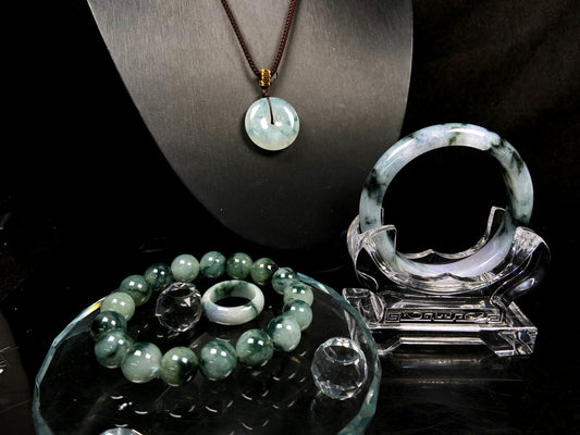 A set of  ink green floating ripples jadeite.