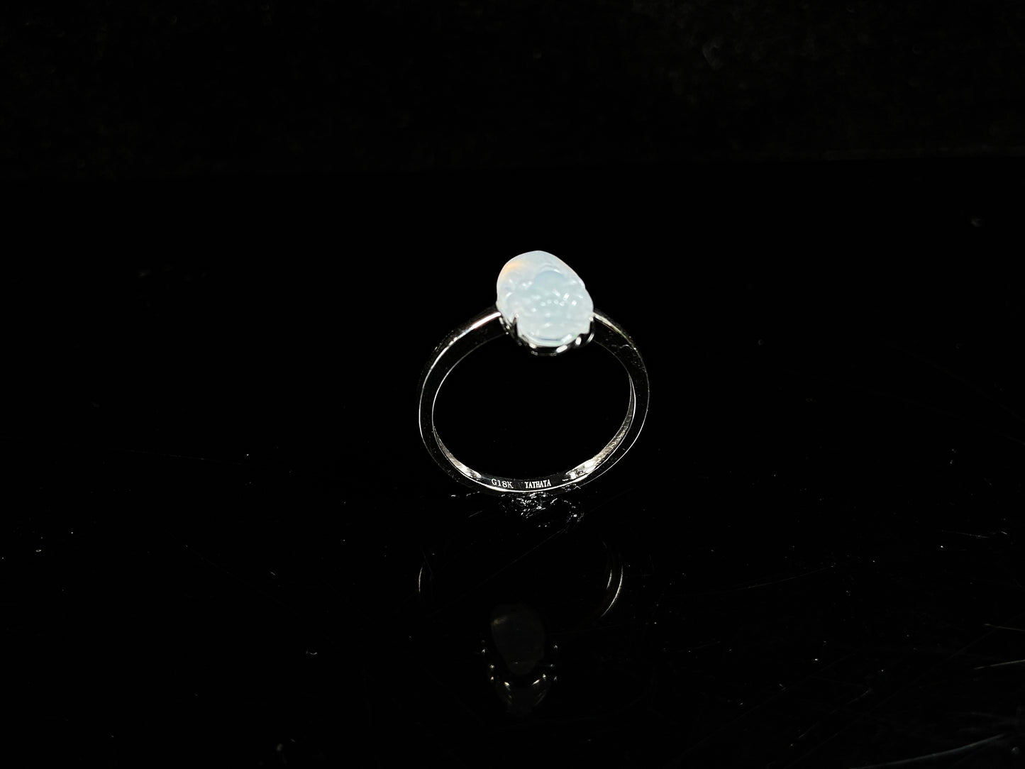 A frosty white fortune pixiu jadeite earrings ring.