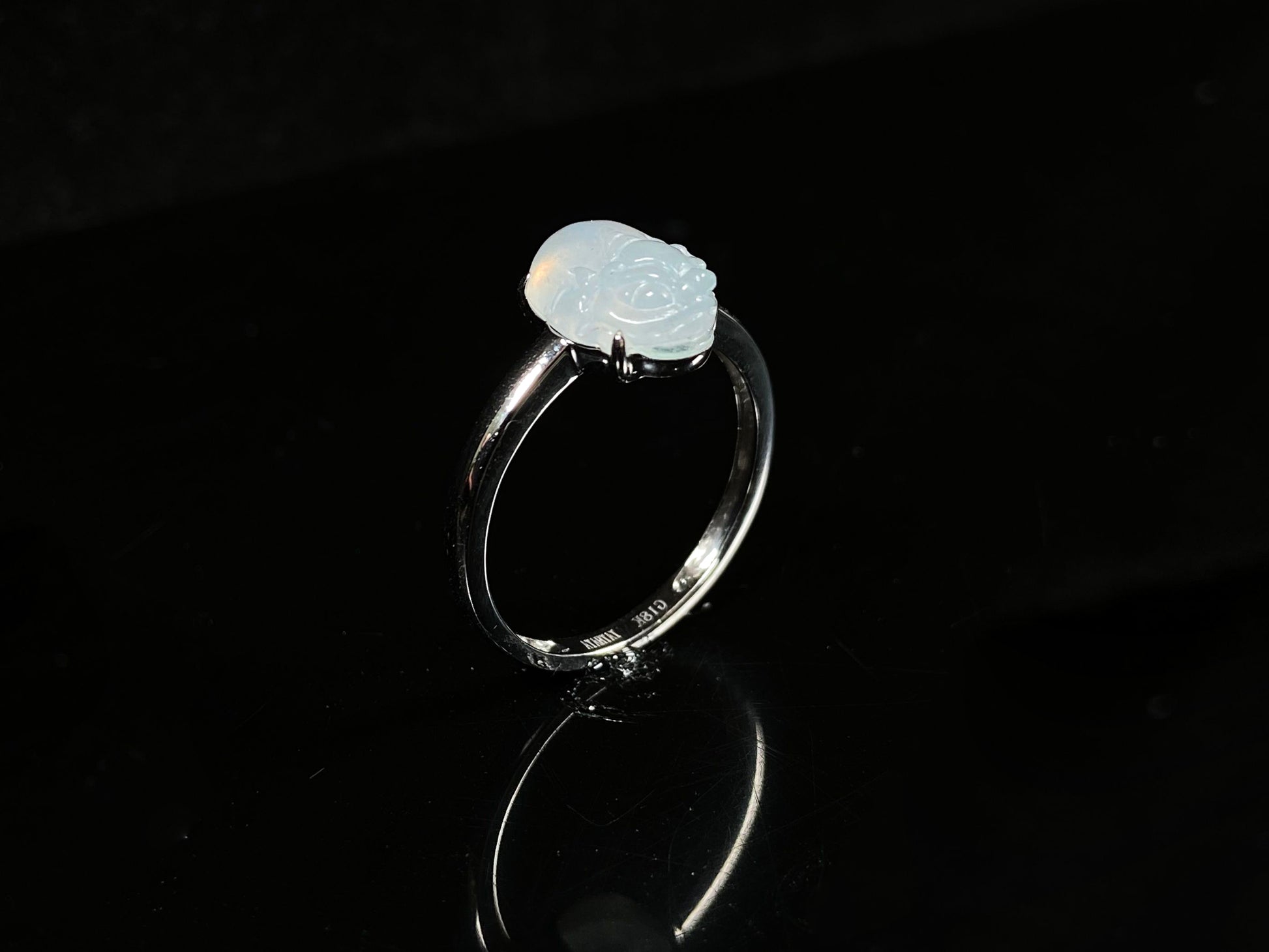 A frosty white fortune pixiu jadeite earrings ring.