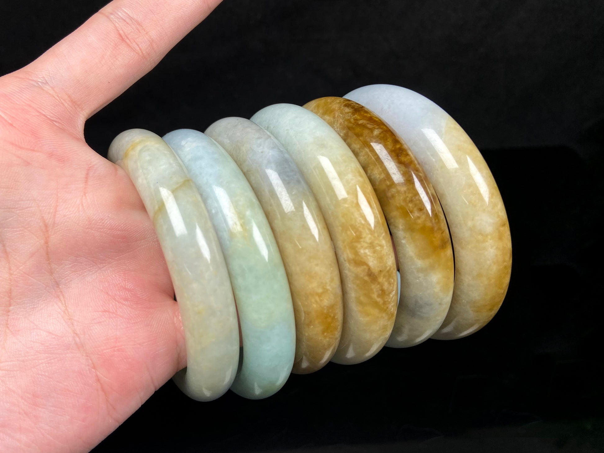 A golden dust sprinkled gently jadeite bangle.