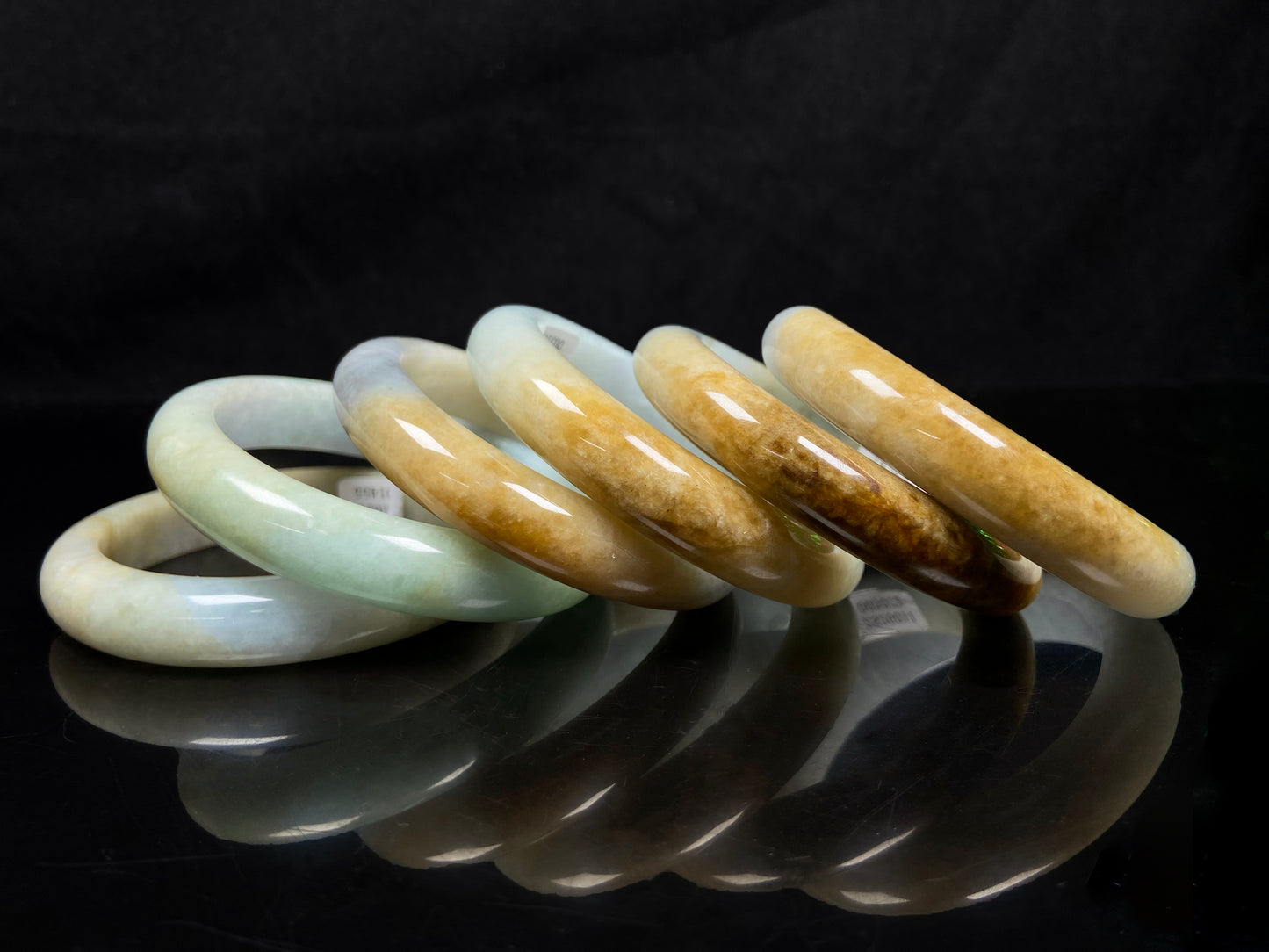A golden dust sprinkled gently jadeite bangle.