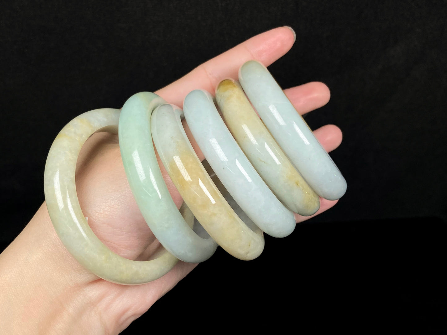 A golden dust sprinkled gently jadeite bangle.