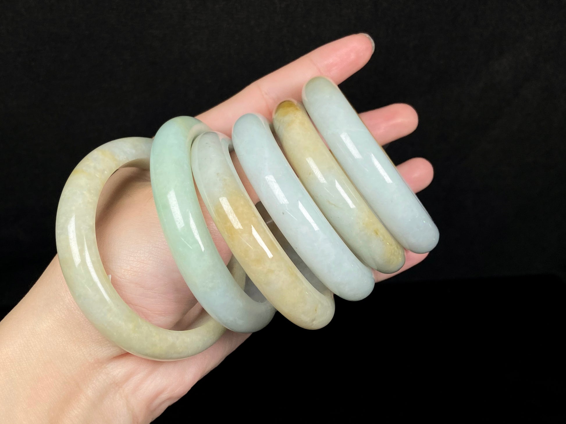 A golden dust sprinkled gently jadeite bangle.