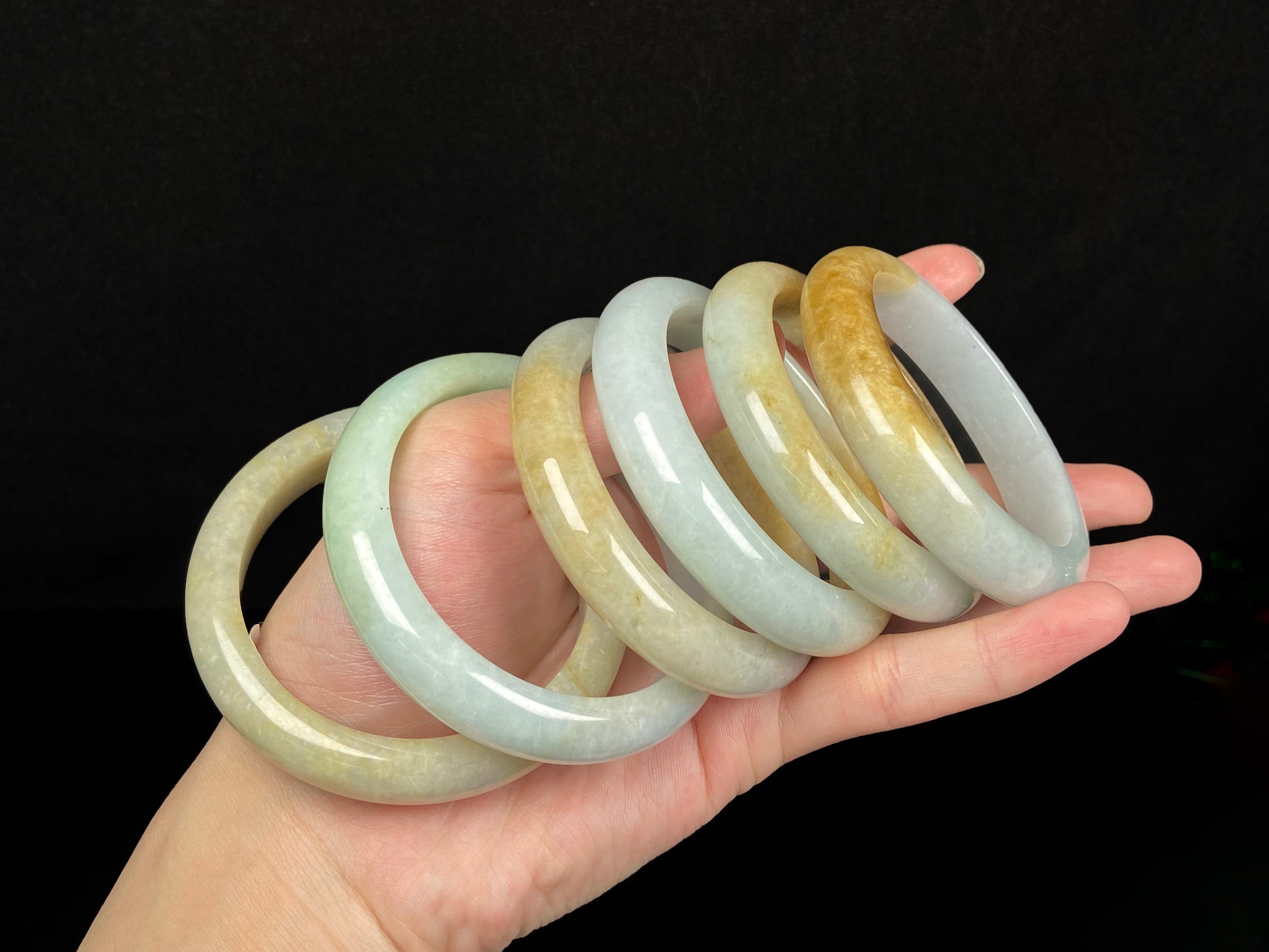 A golden dust sprinkled gently jadeite bangle.