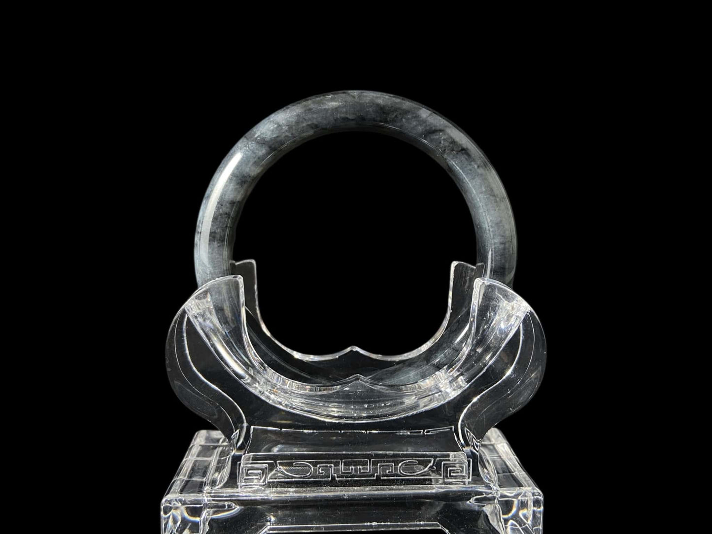 A grey cloud veil jadeite bangle.