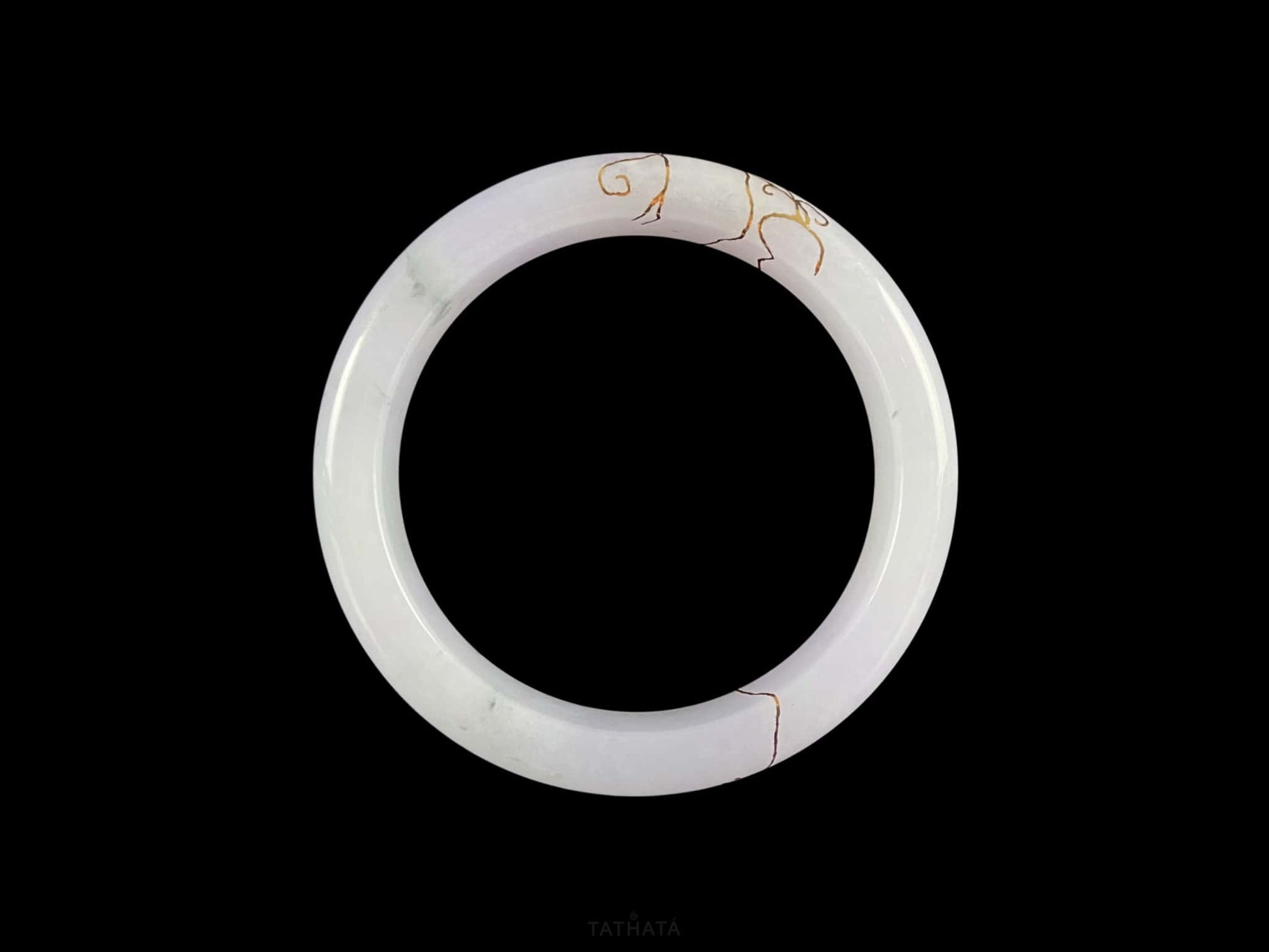 A pale violet golden stitch jadeite bangle.