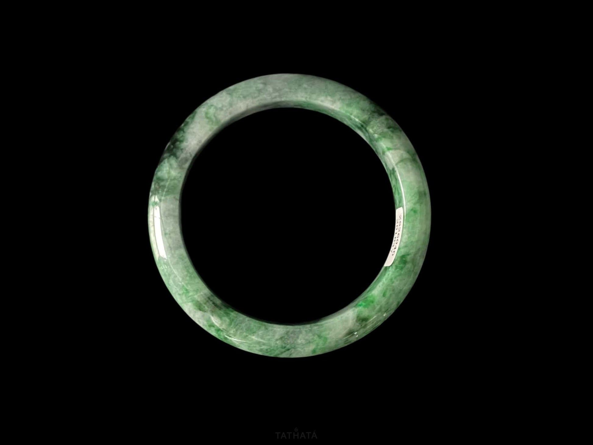 A mossy forest veil jadeite bangle.