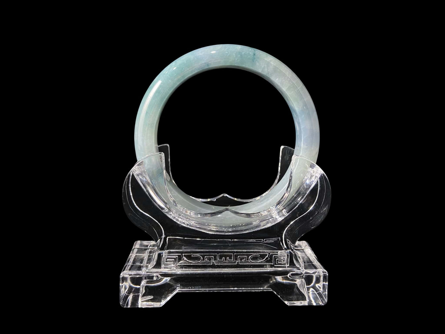A sky blue cloud jadeite bangle.
