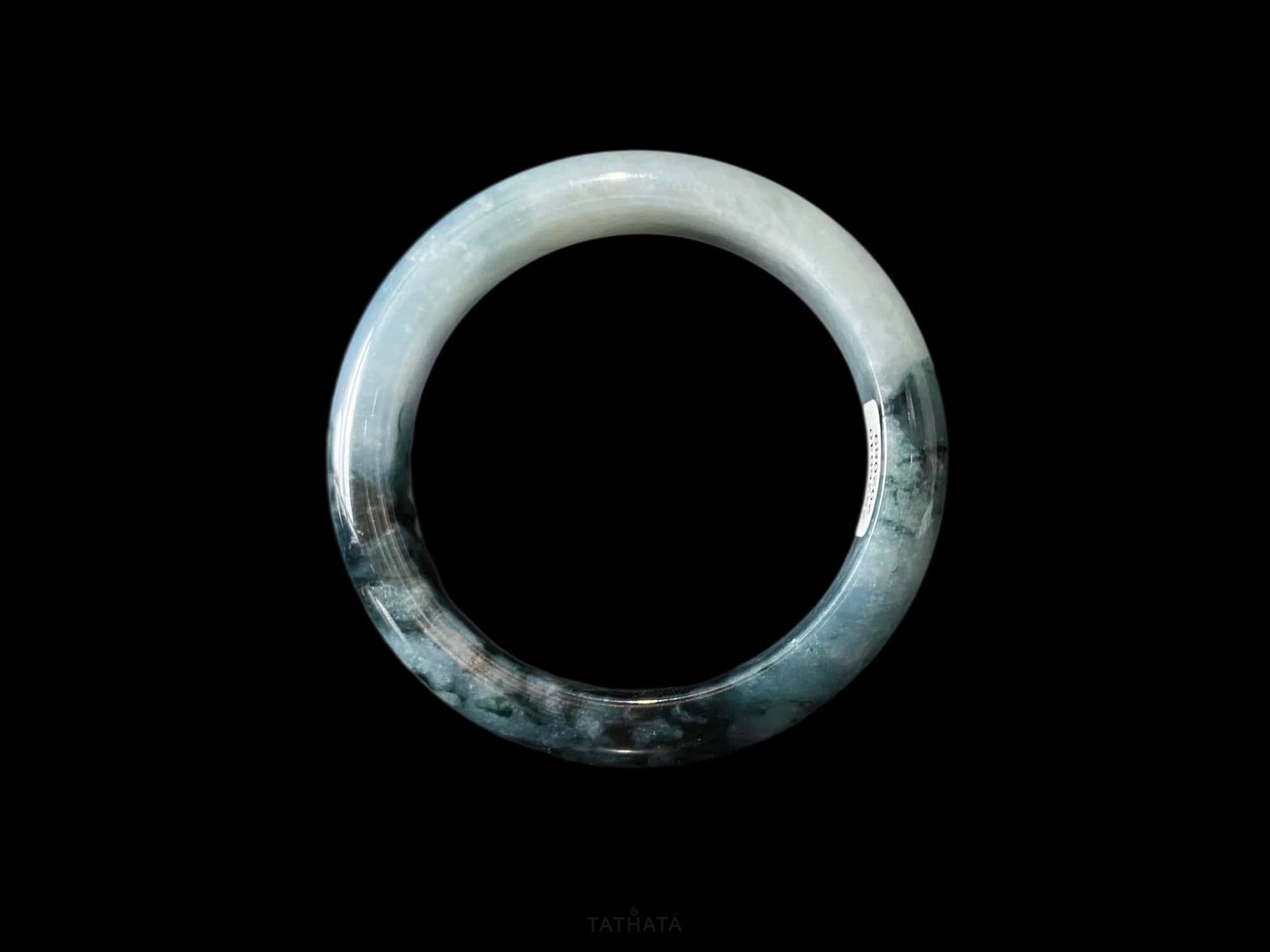 A blue dusk radiance jadeite bangle.