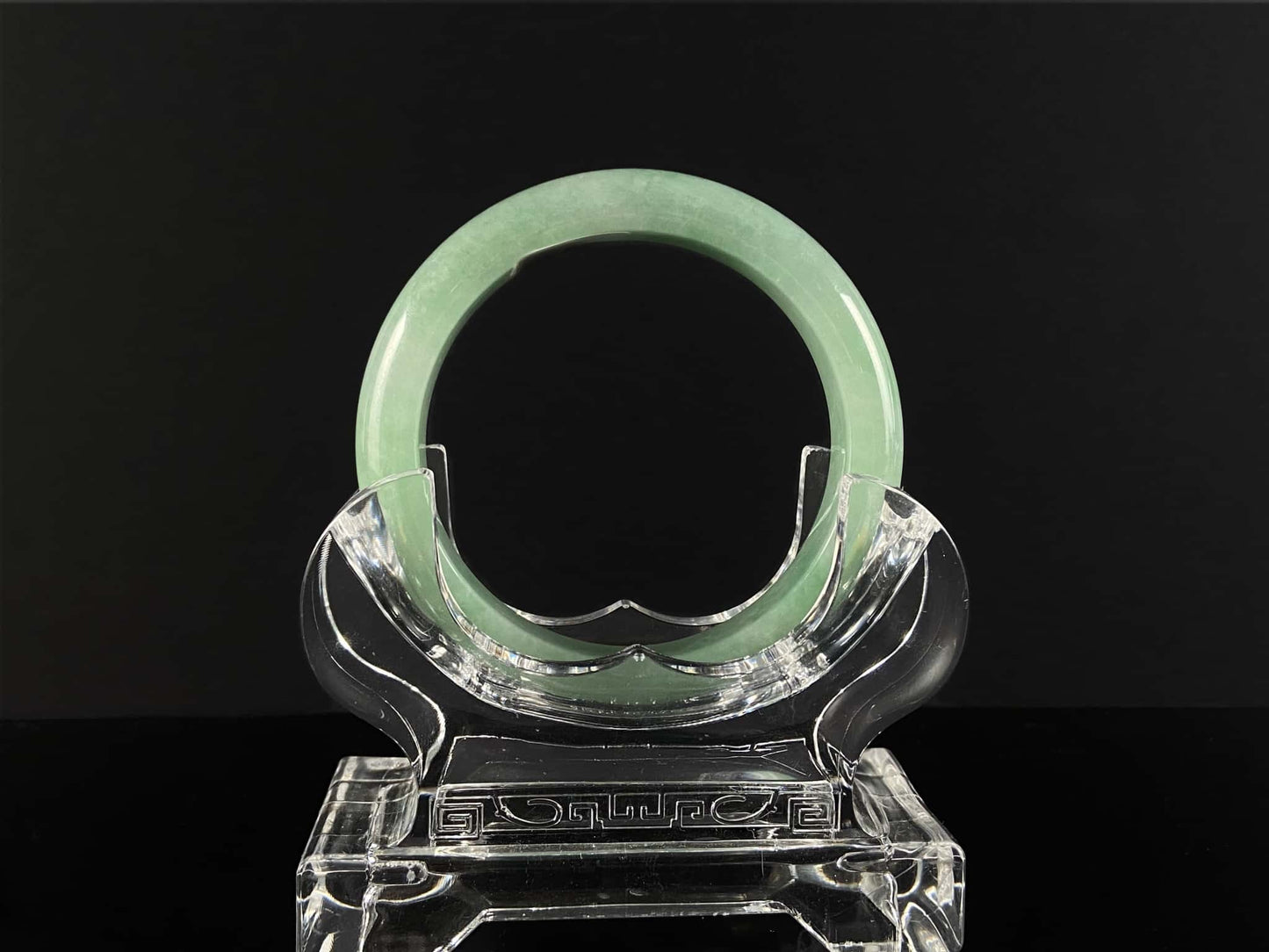 A pale spring green mist jadeite bangle.