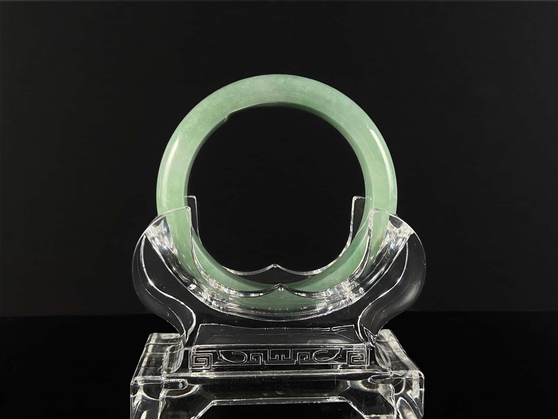 A pale spring green mist jadeite bangle.