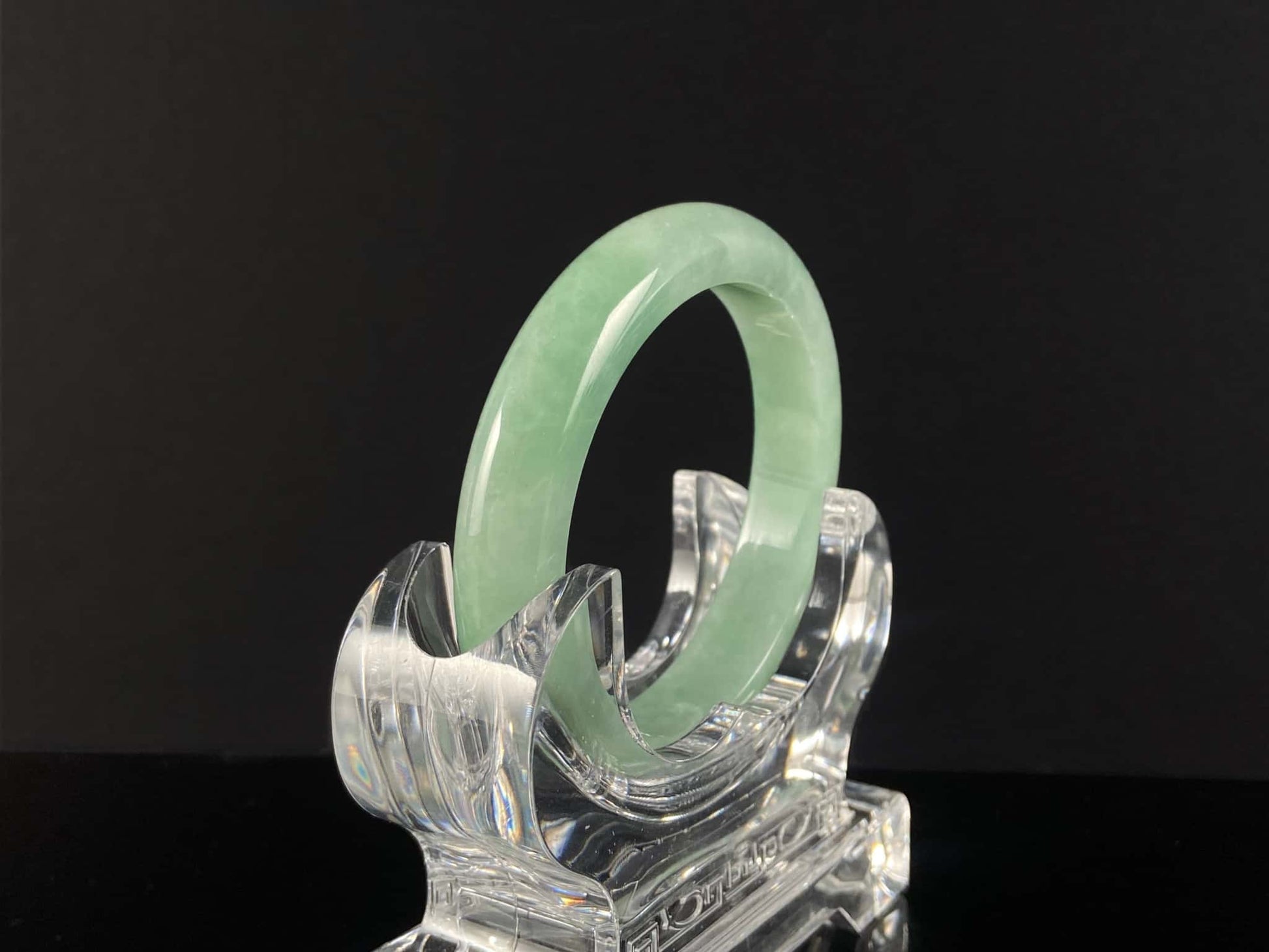 A pale spring green mist jadeite bangle.