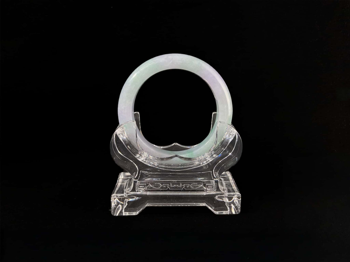 A mist lilac spring green jadeite bangle.