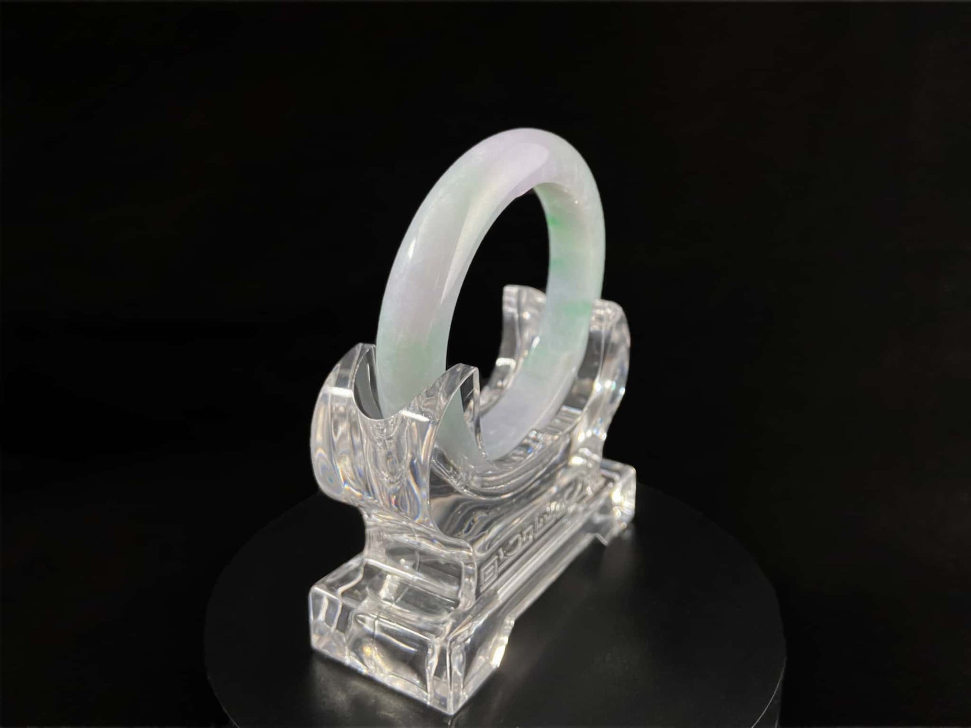 A mist lilac spring green jadeite bangle.