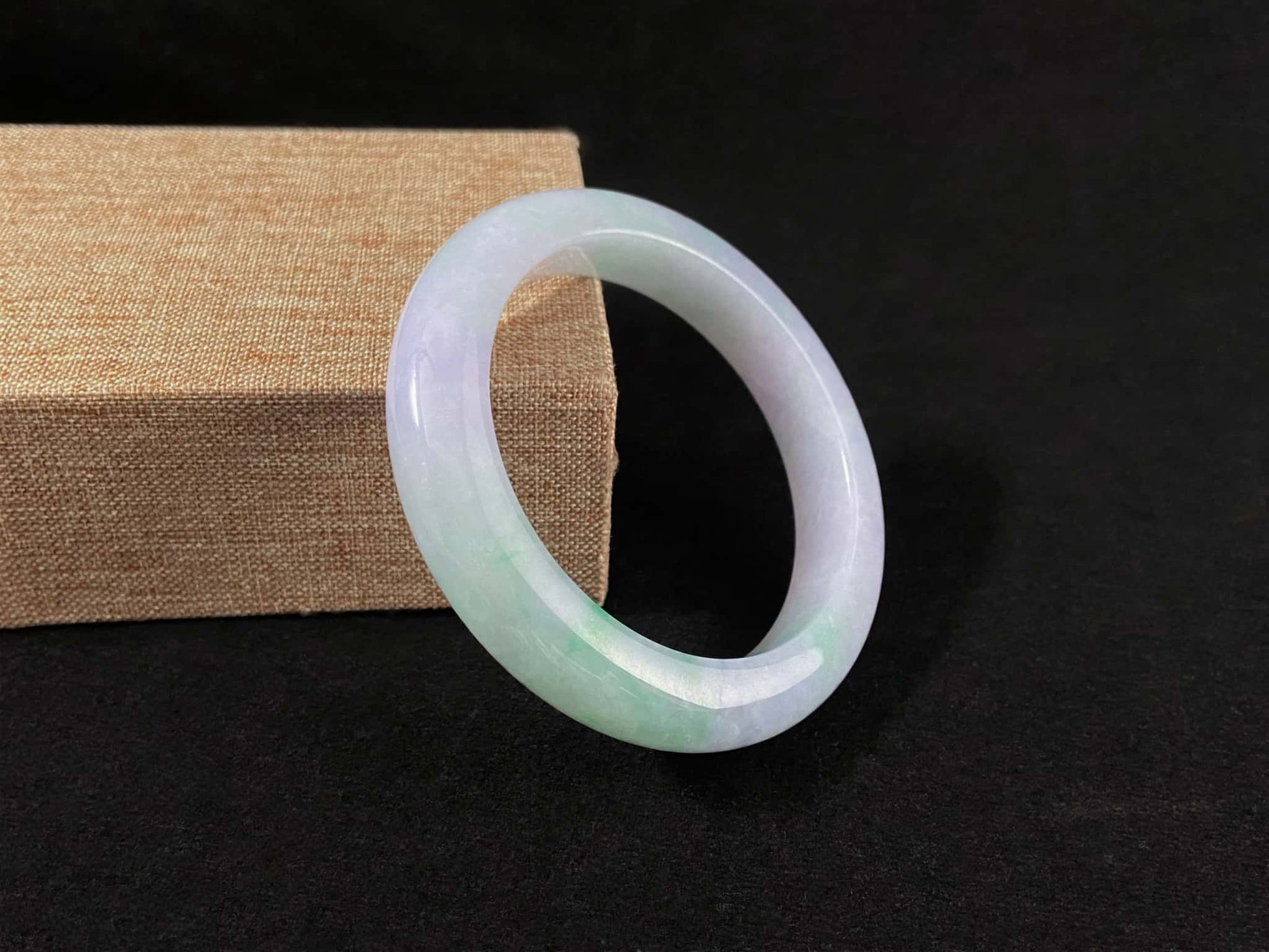 A mist lilac spring green jadeite bangle.