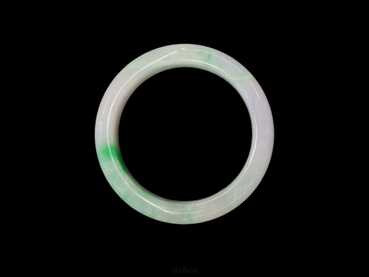 A lavender mint vein jadeite bangle.