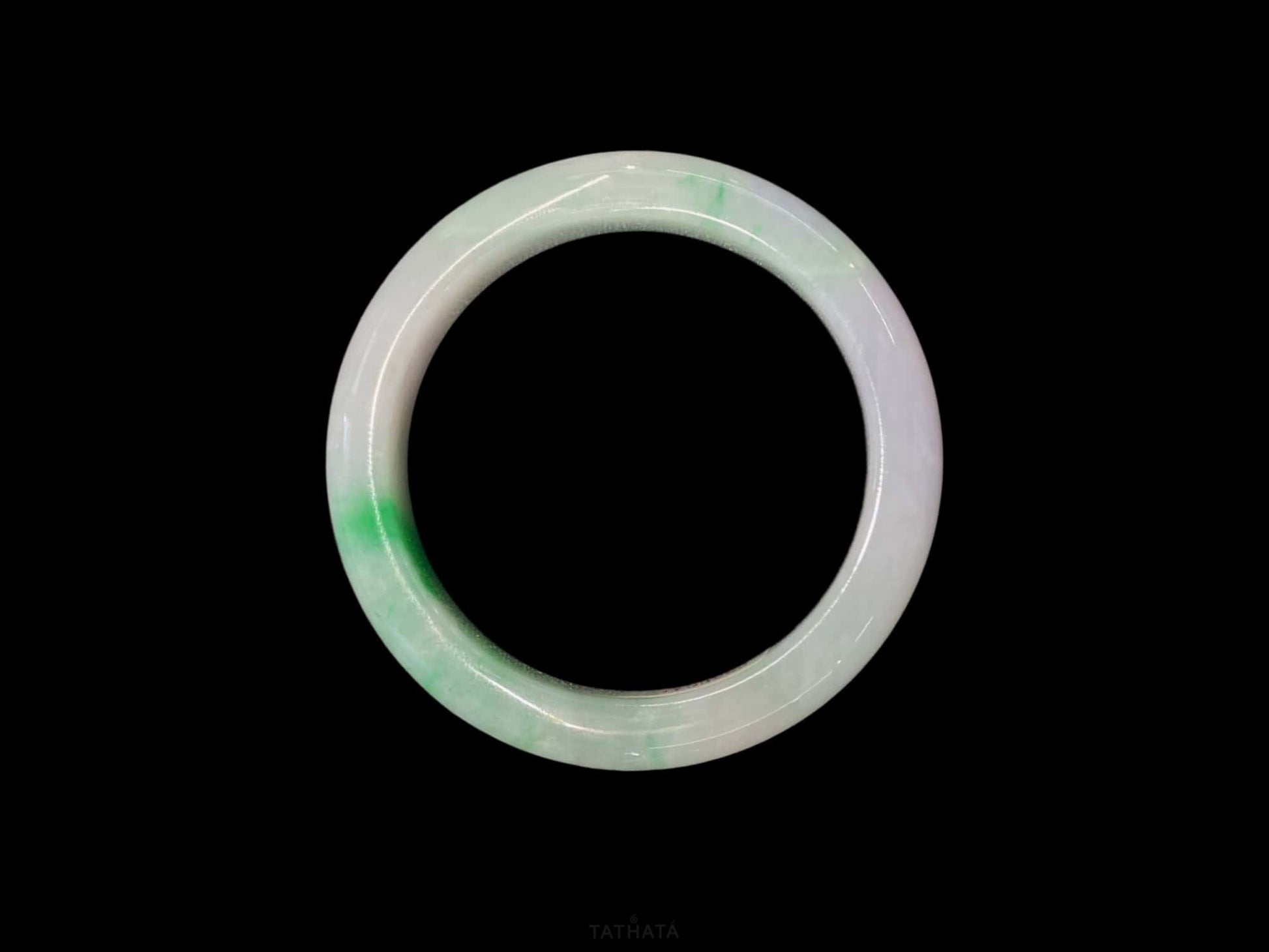 A lavender mint vein jadeite bangle.