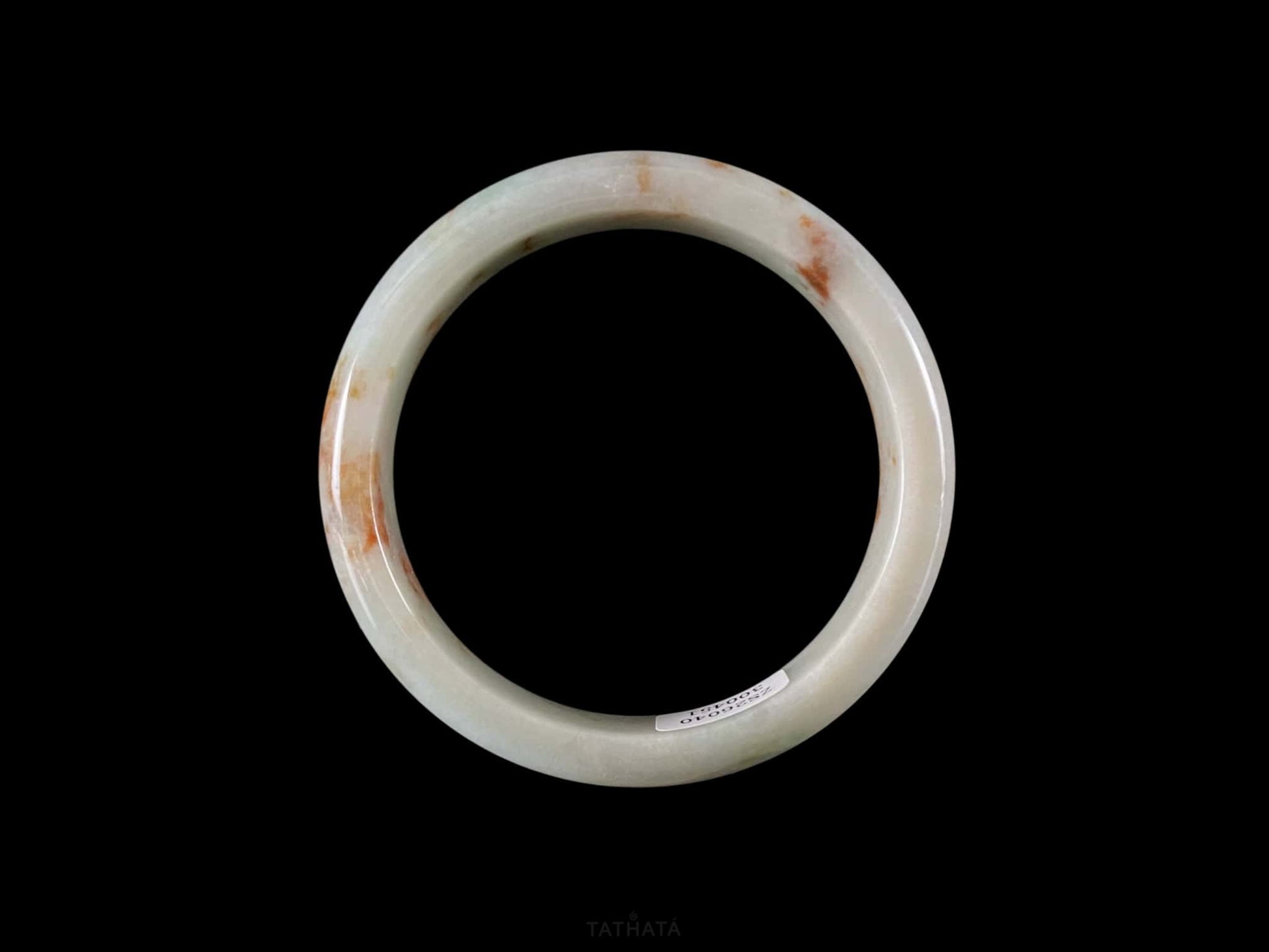 A moss coral calm jadeite bangle.
