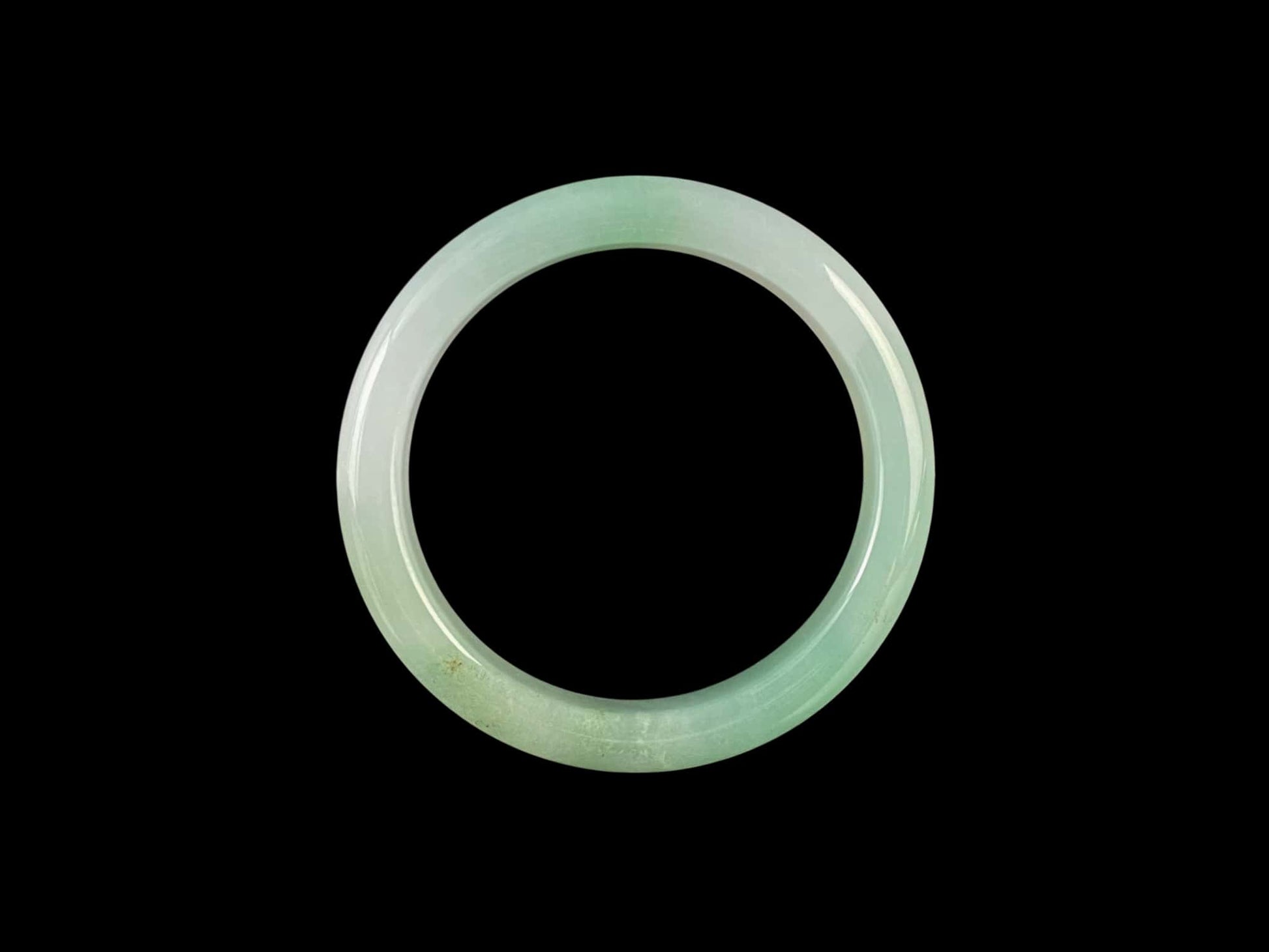 A mint gradient veil jadeite bangle.