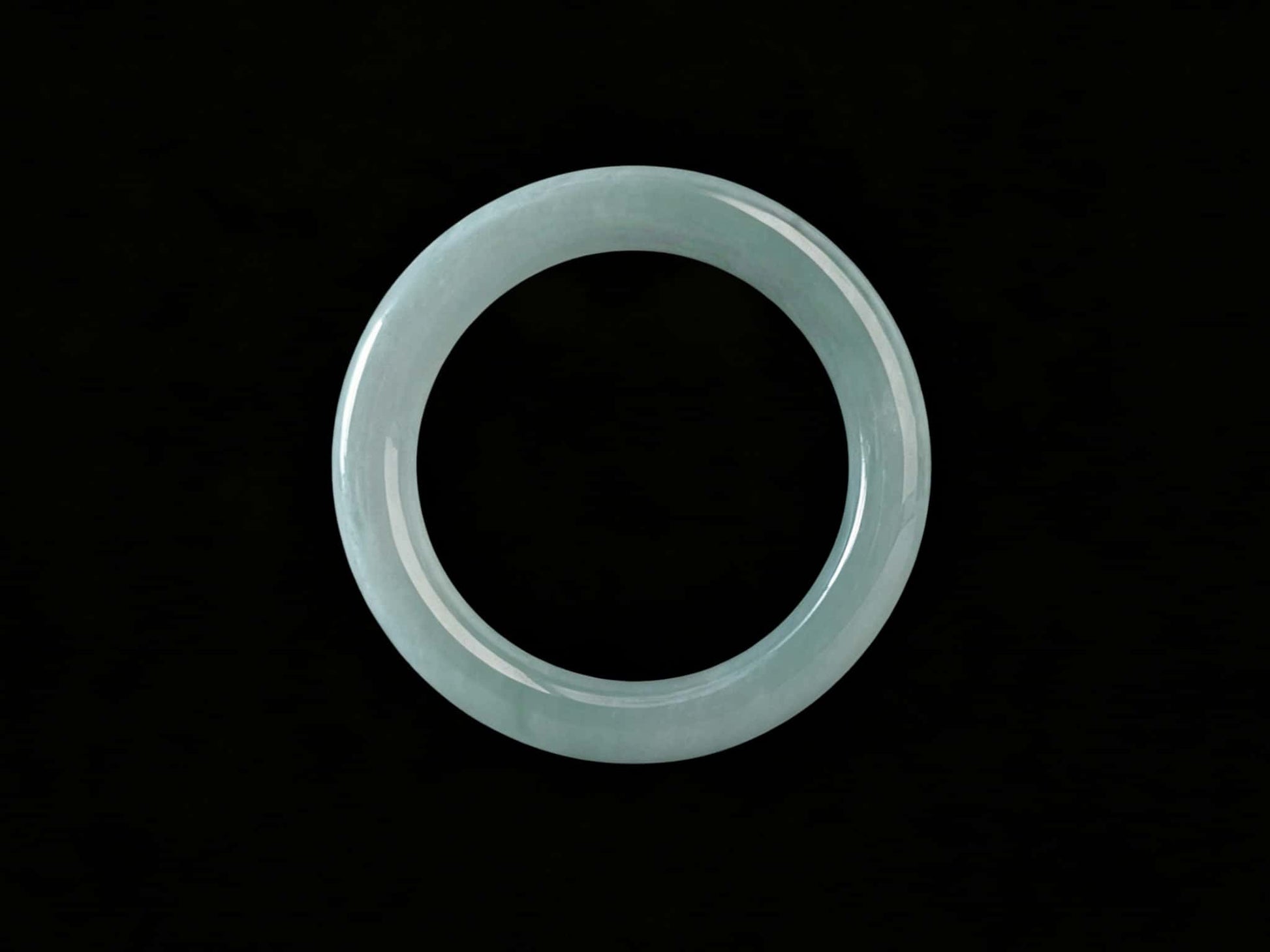 A icy blue calm jadeite bangle.