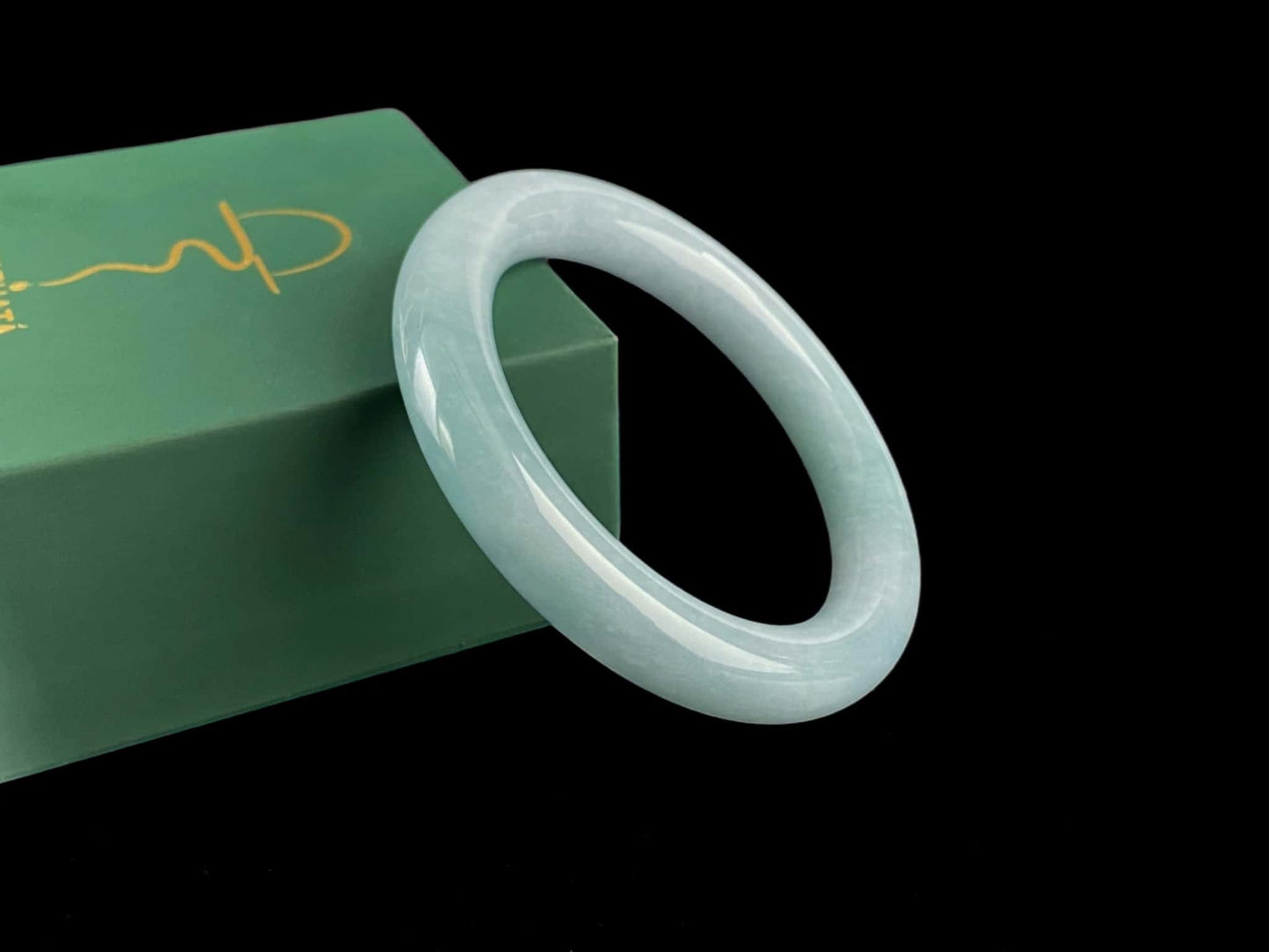 A icy blue calm jadeite bangle.