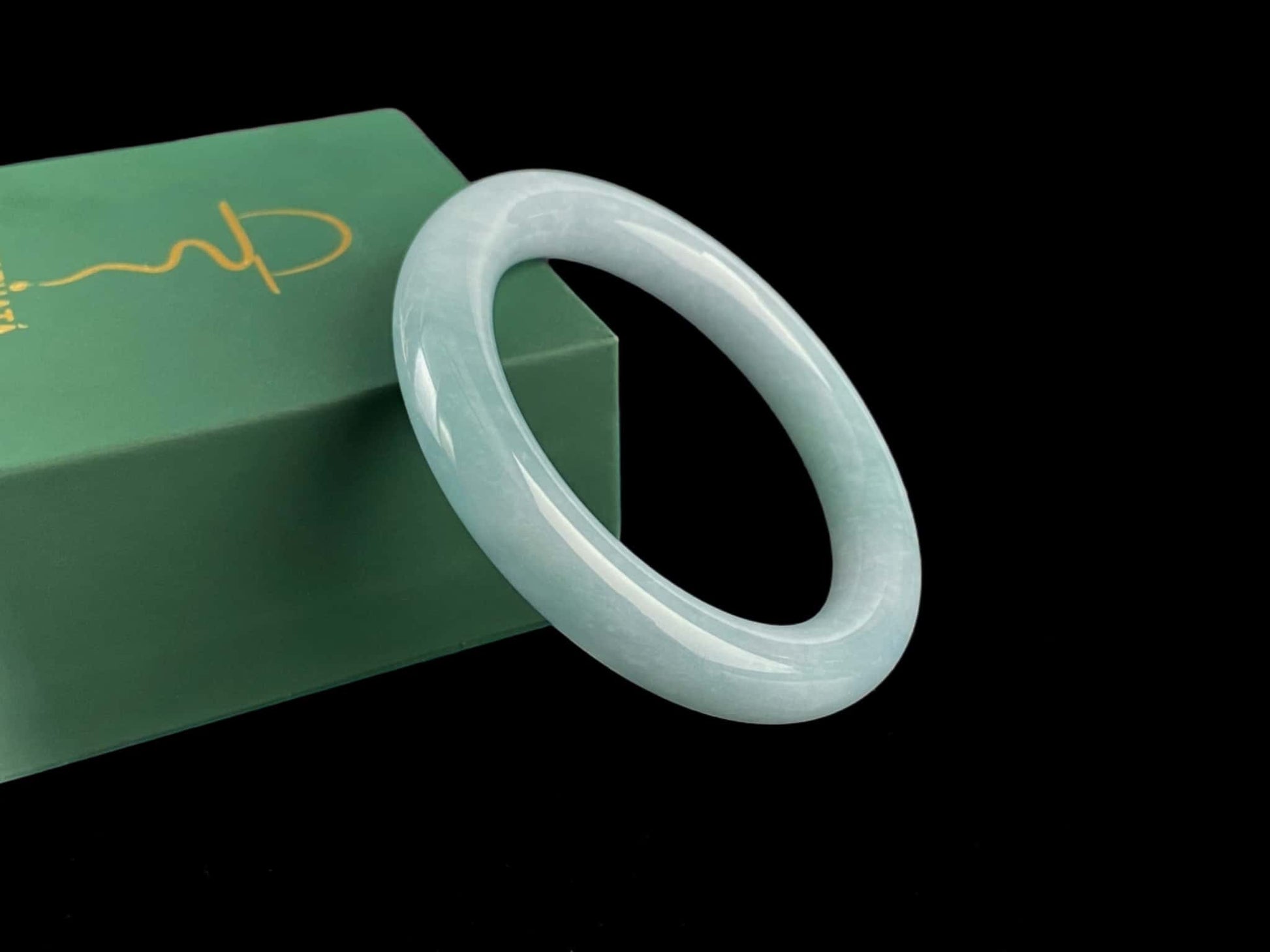A icy blue calm jadeite bangle.