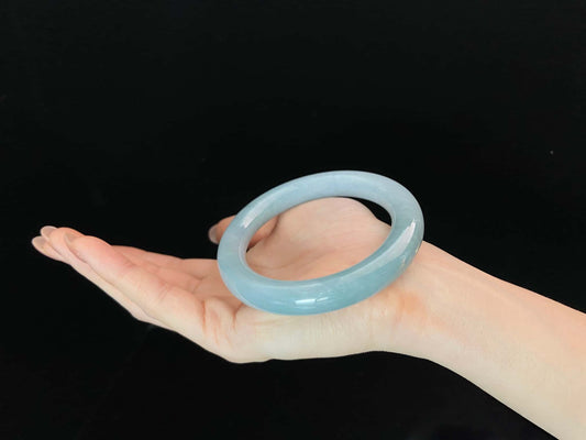 A icy blue calm jadeite bangle.