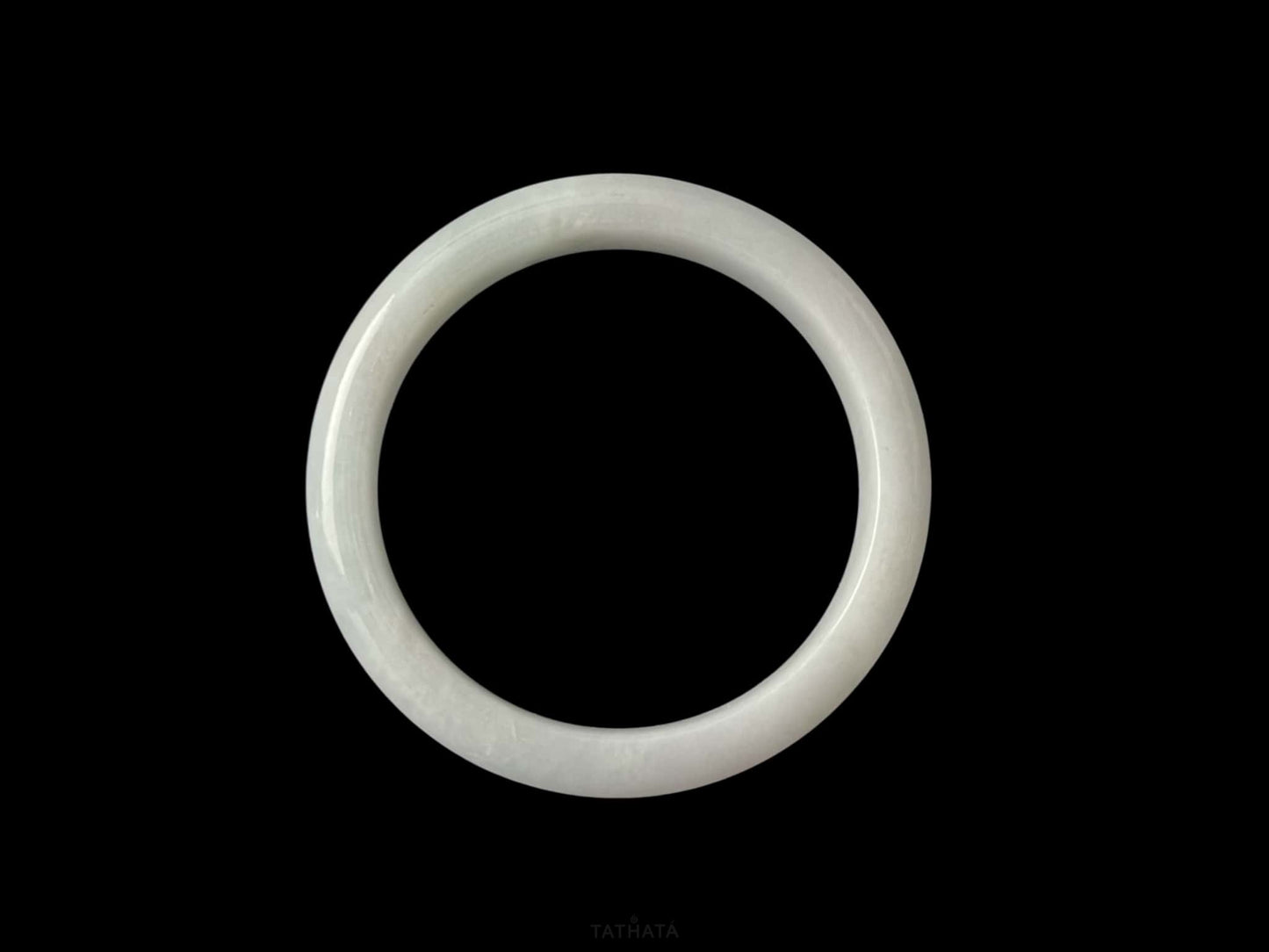 A cloudy milk white jadeite bangle.