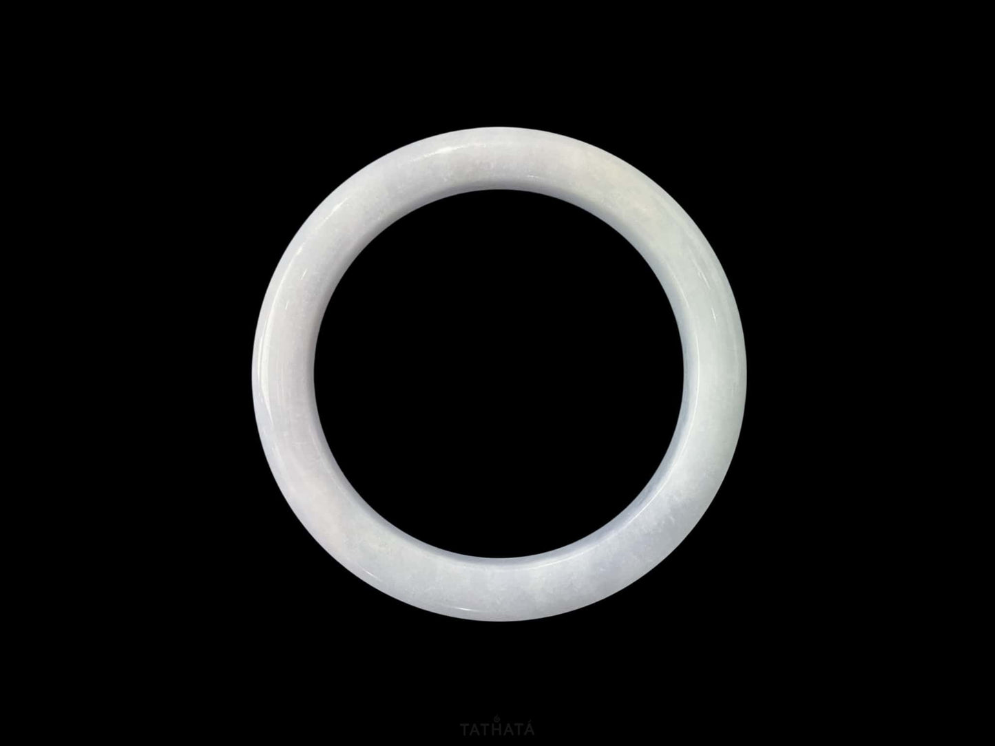 A coudy green mist jadeite bangle.