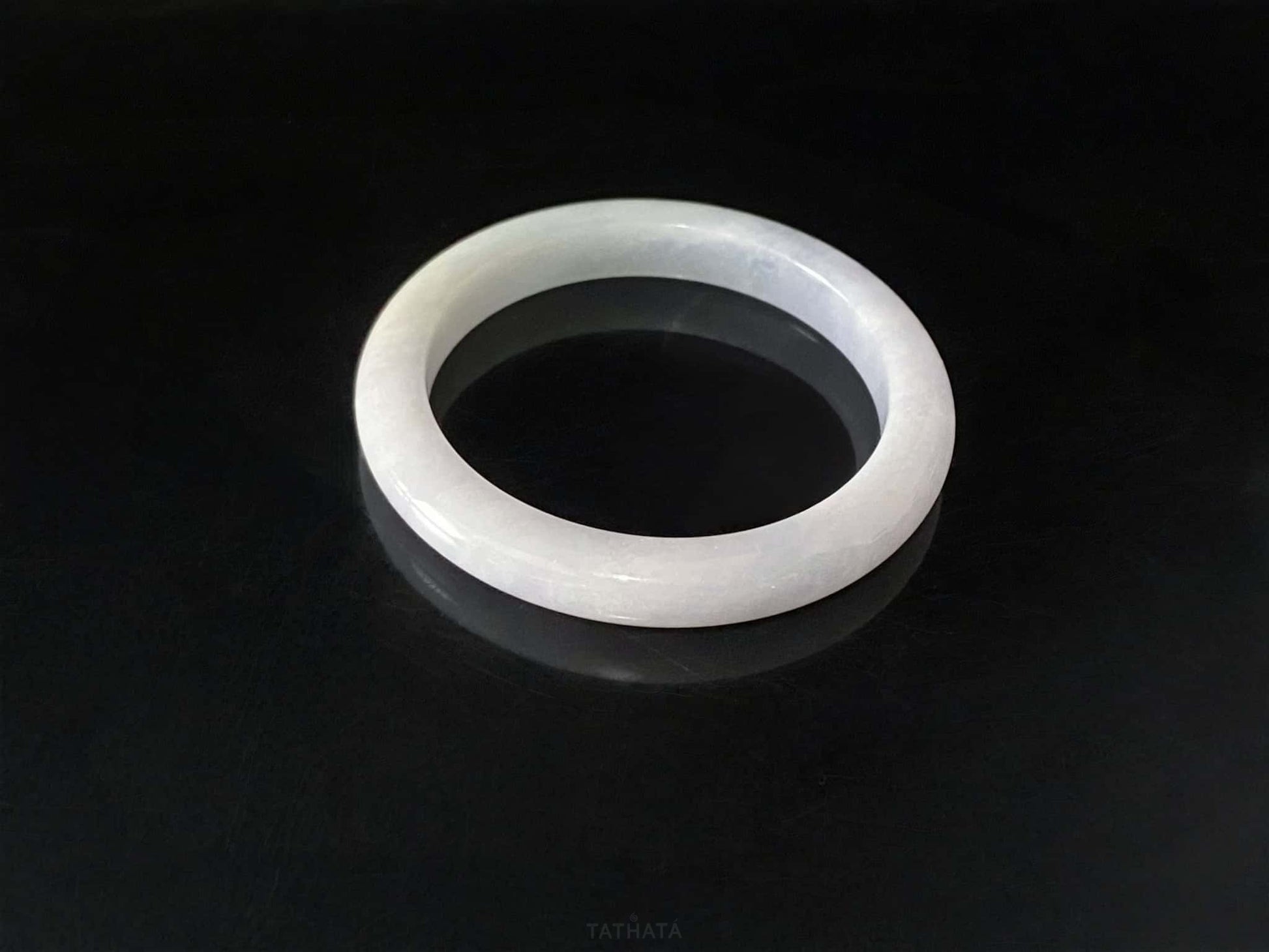 A coudy green mist jadeite bangle.