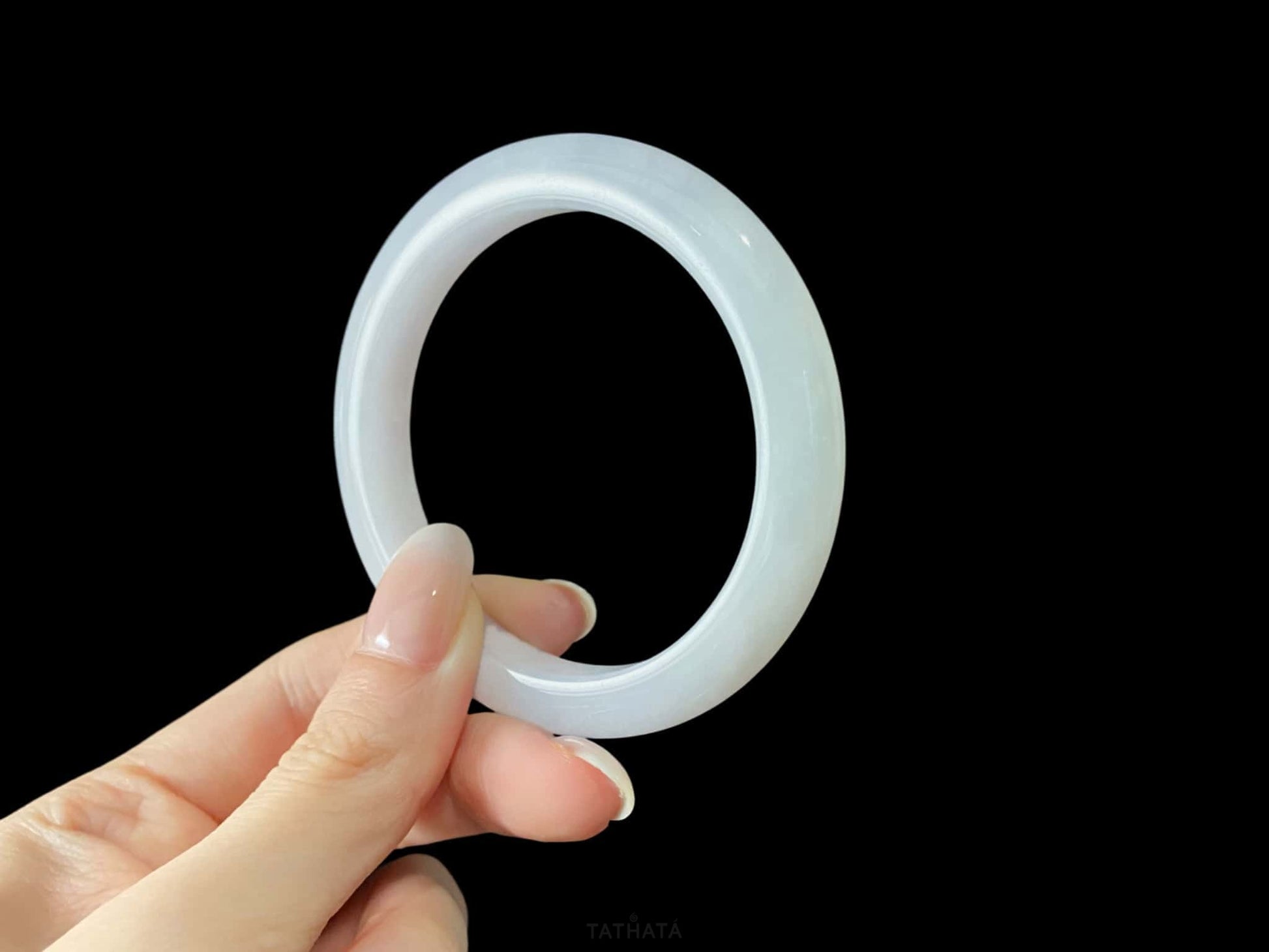 A coudy green mist jadeite bangle.