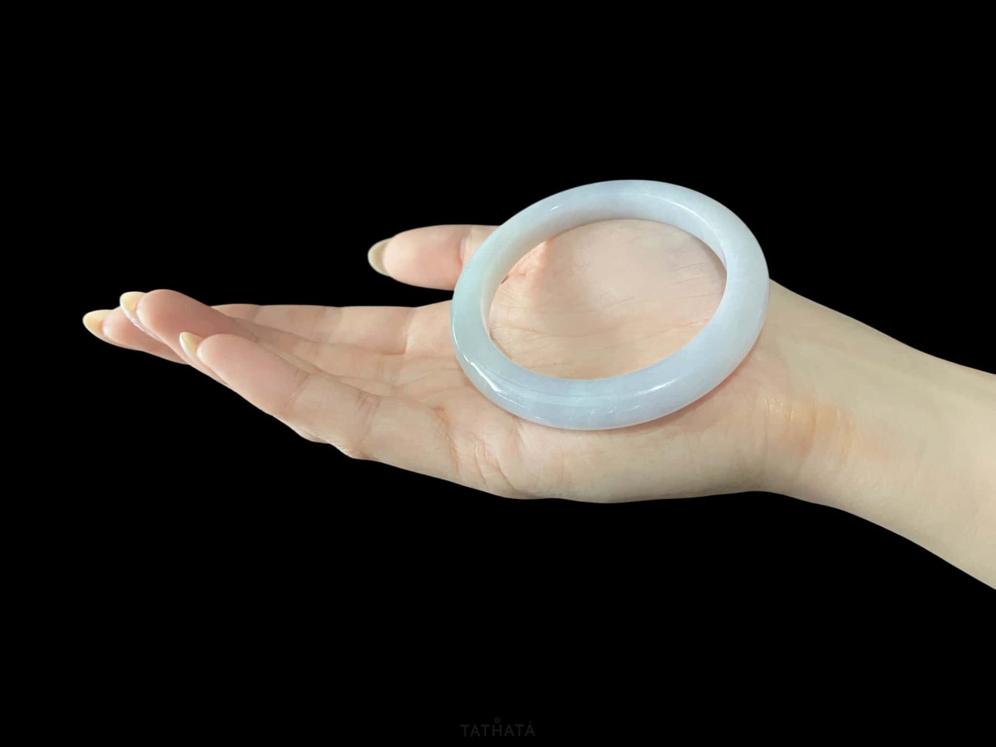 A coudy green mist jadeite bangle.