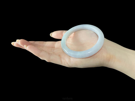 A coudy green mist jadeite bangle.