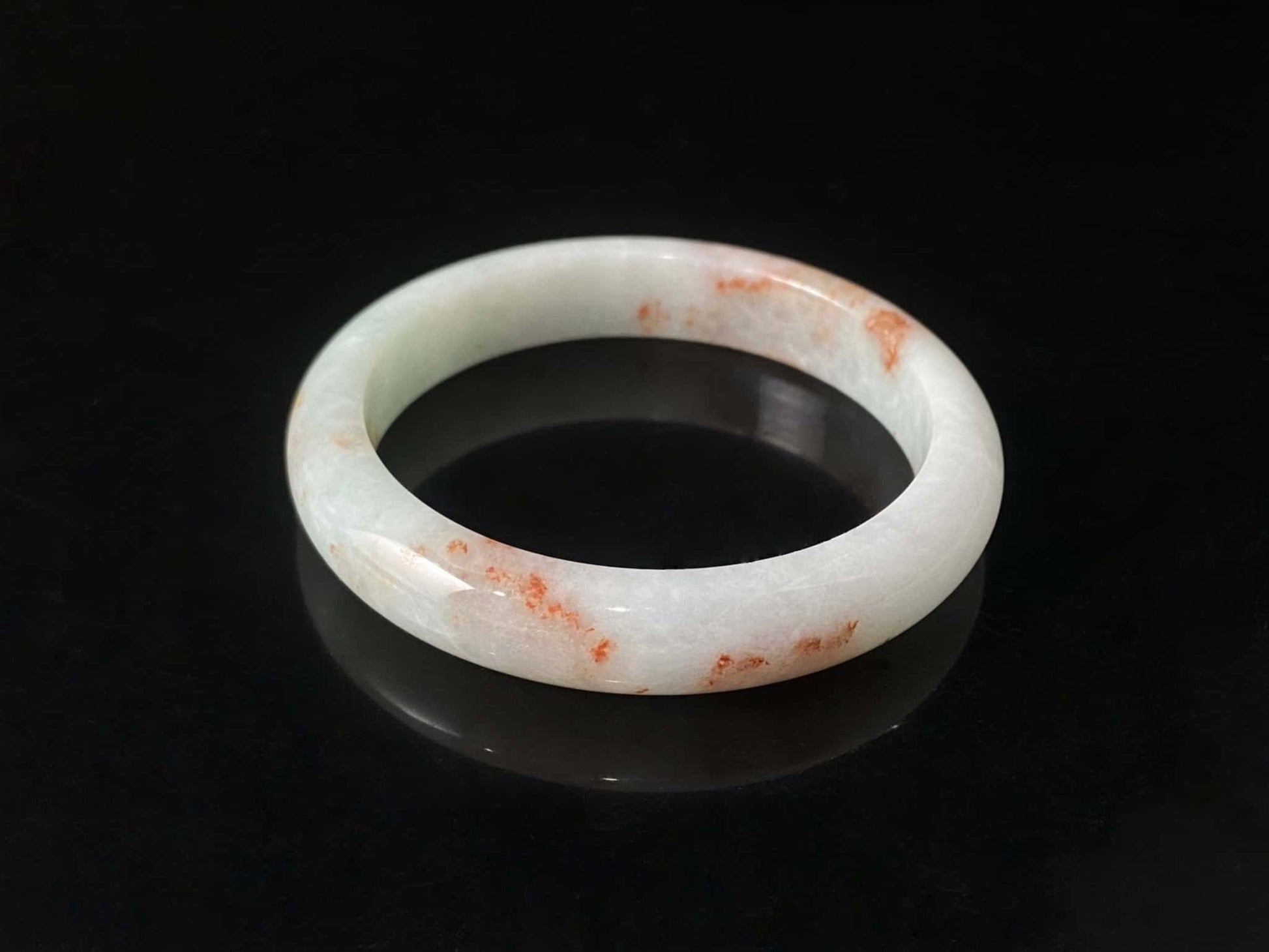 A pale spring green mist jadeite bangle.