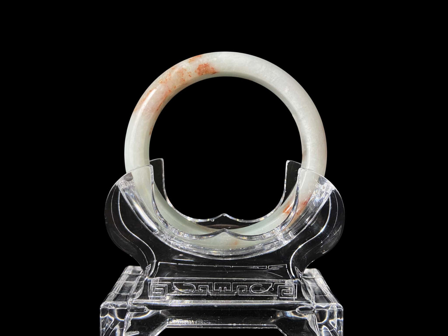 A pale spring green mist jadeite bangle.