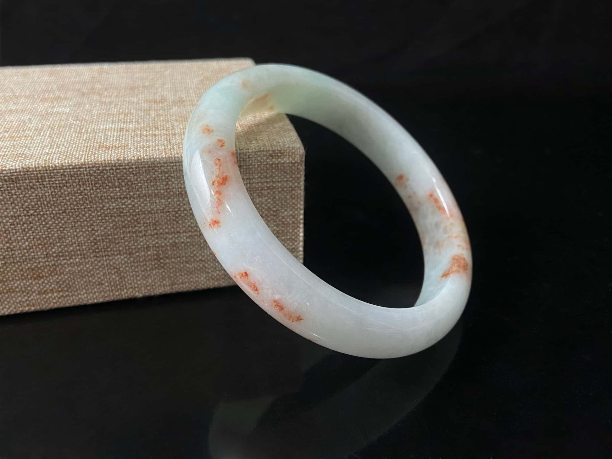 A pale spring green mist jadeite bangle.