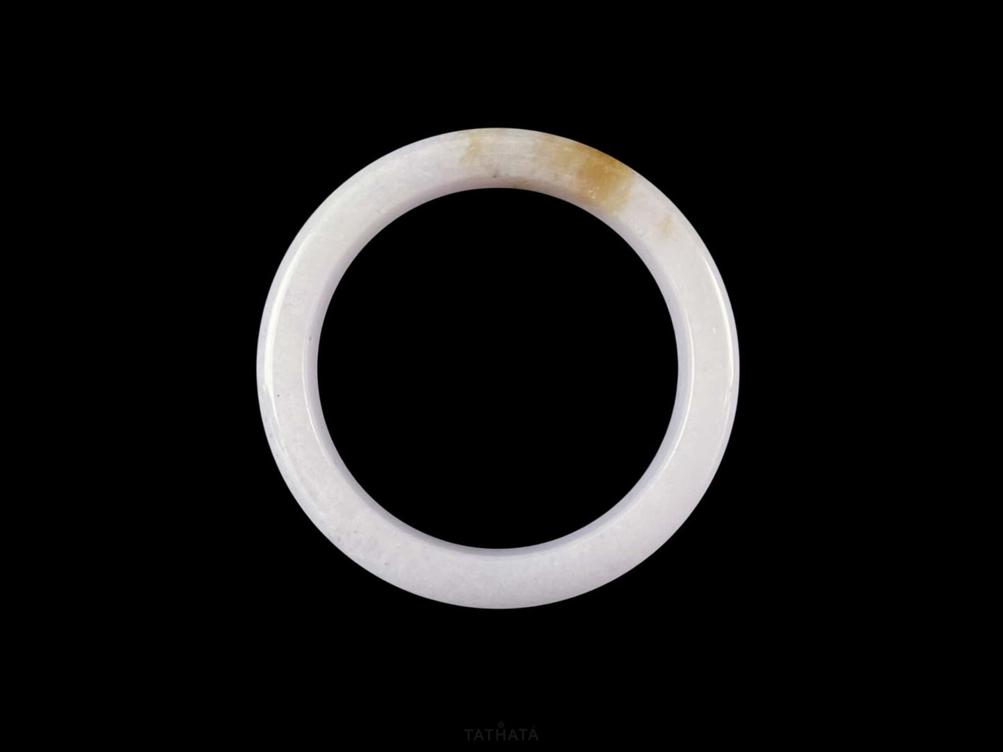 A lavender golden tip jadeite bangle.