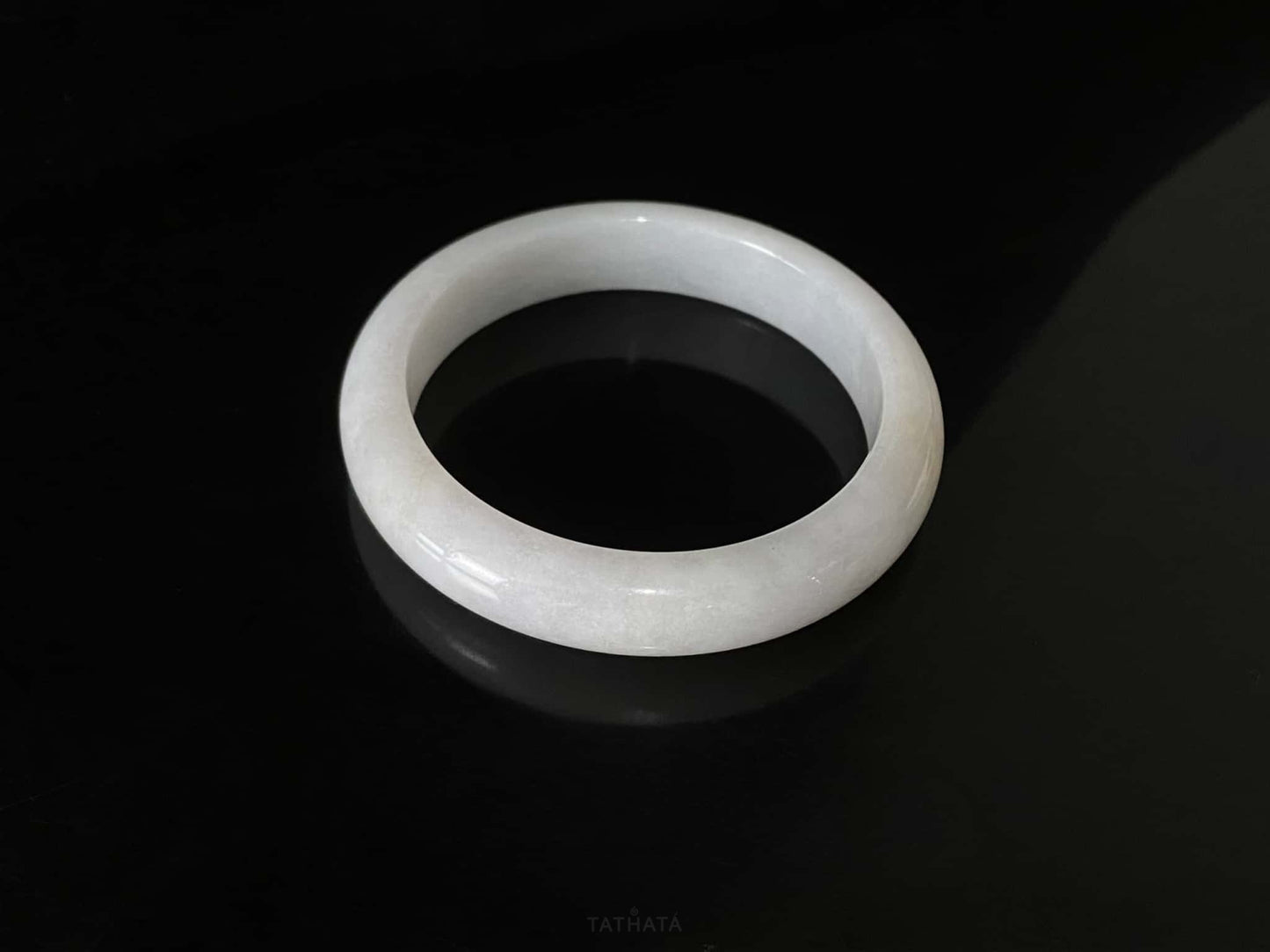 A ivory mist veil jadeite bangle.