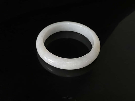 A ivory mist veil jadeite bangle.