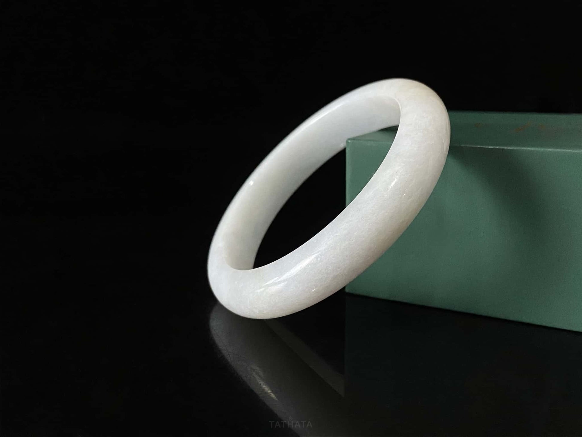 A ivory mist veil jadeite bangle.