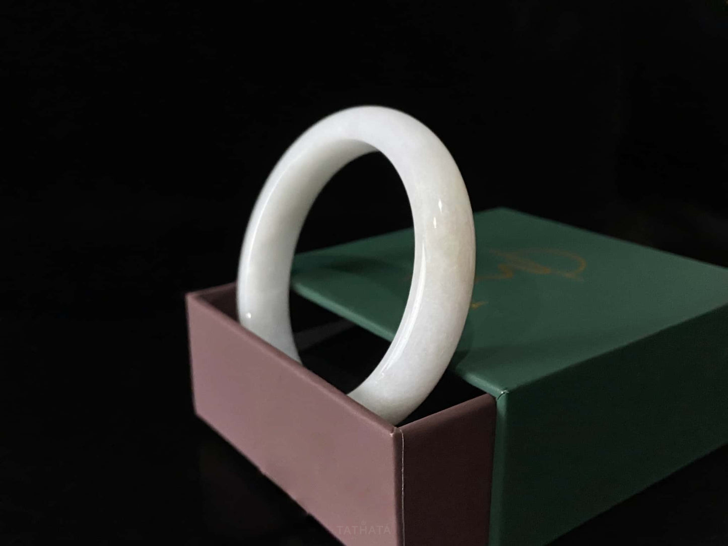 A ivory mist veil jadeite bangle.