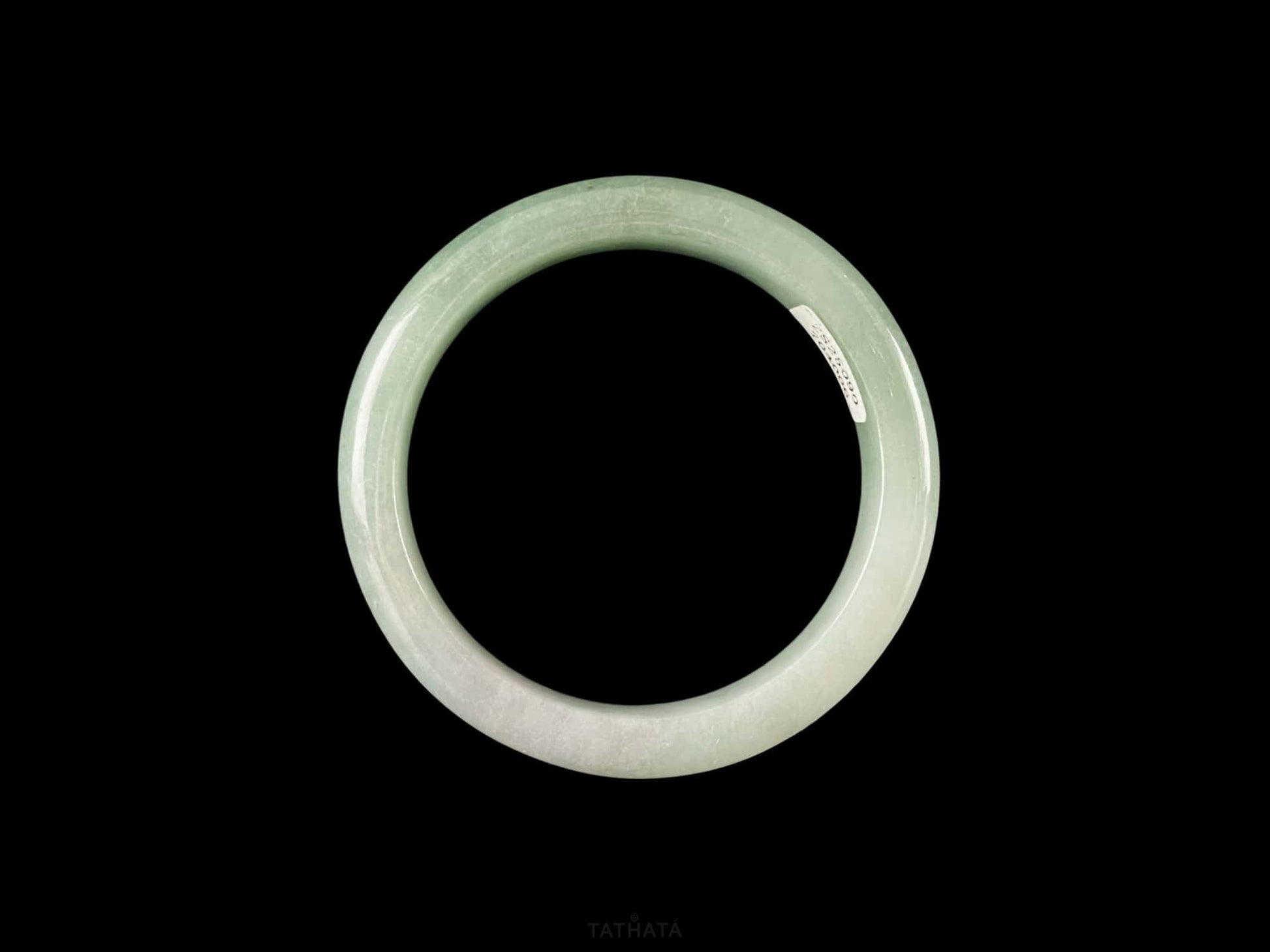A willow green white veil jadeite bangle.