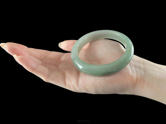 A willow green white veil jadeite bangle.