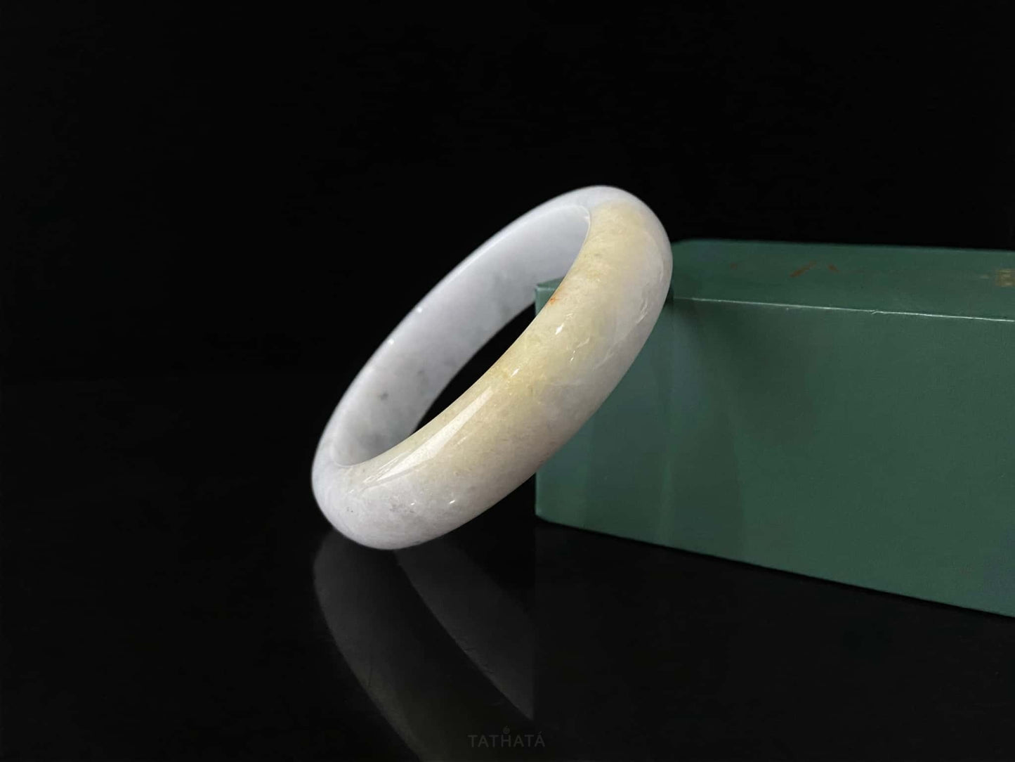 A honey amber halo jadeite bangle.