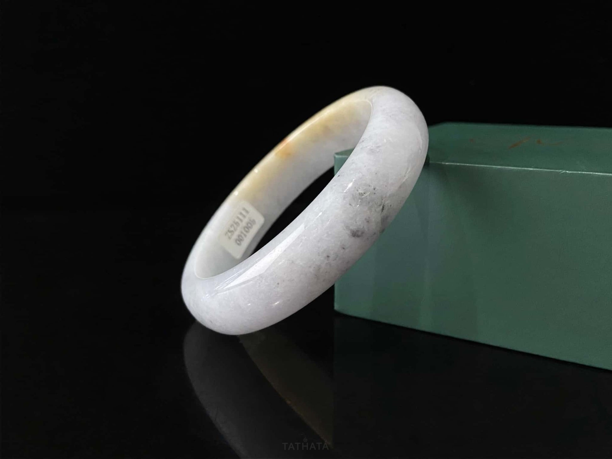 A honey amber halo jadeite bangle.