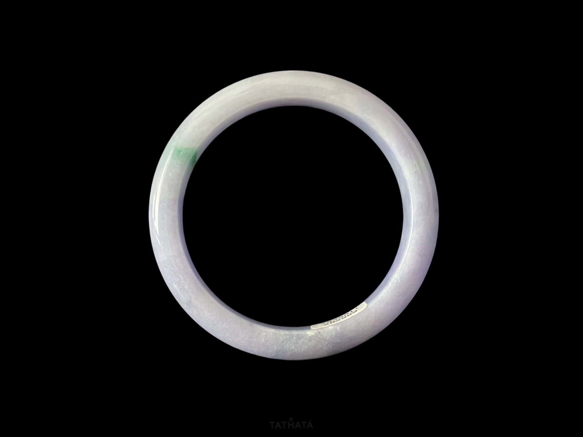 A lavender green streak jadeite bangle.